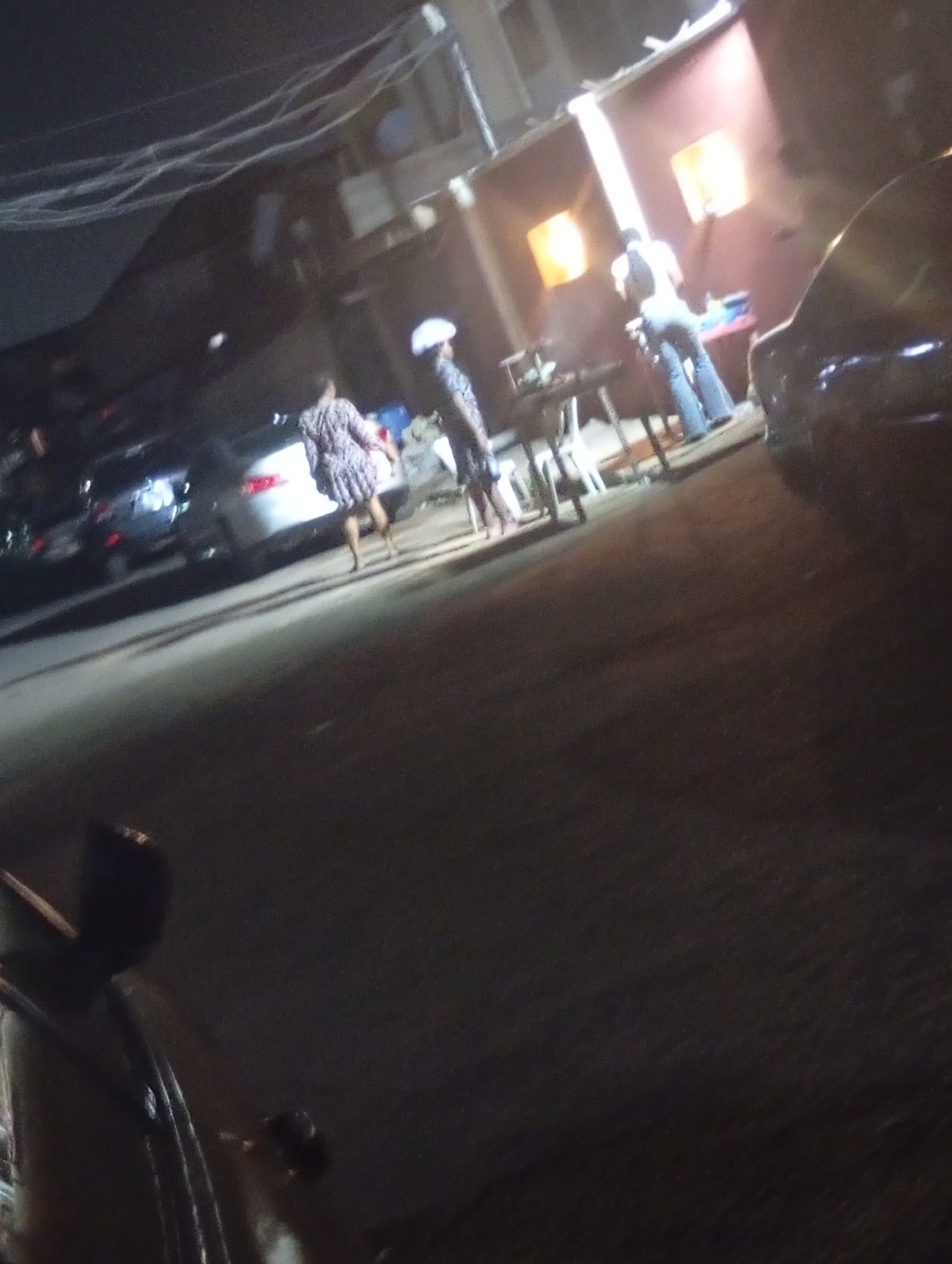Evening street life documented in Shangisha, Nigeria neighborhood