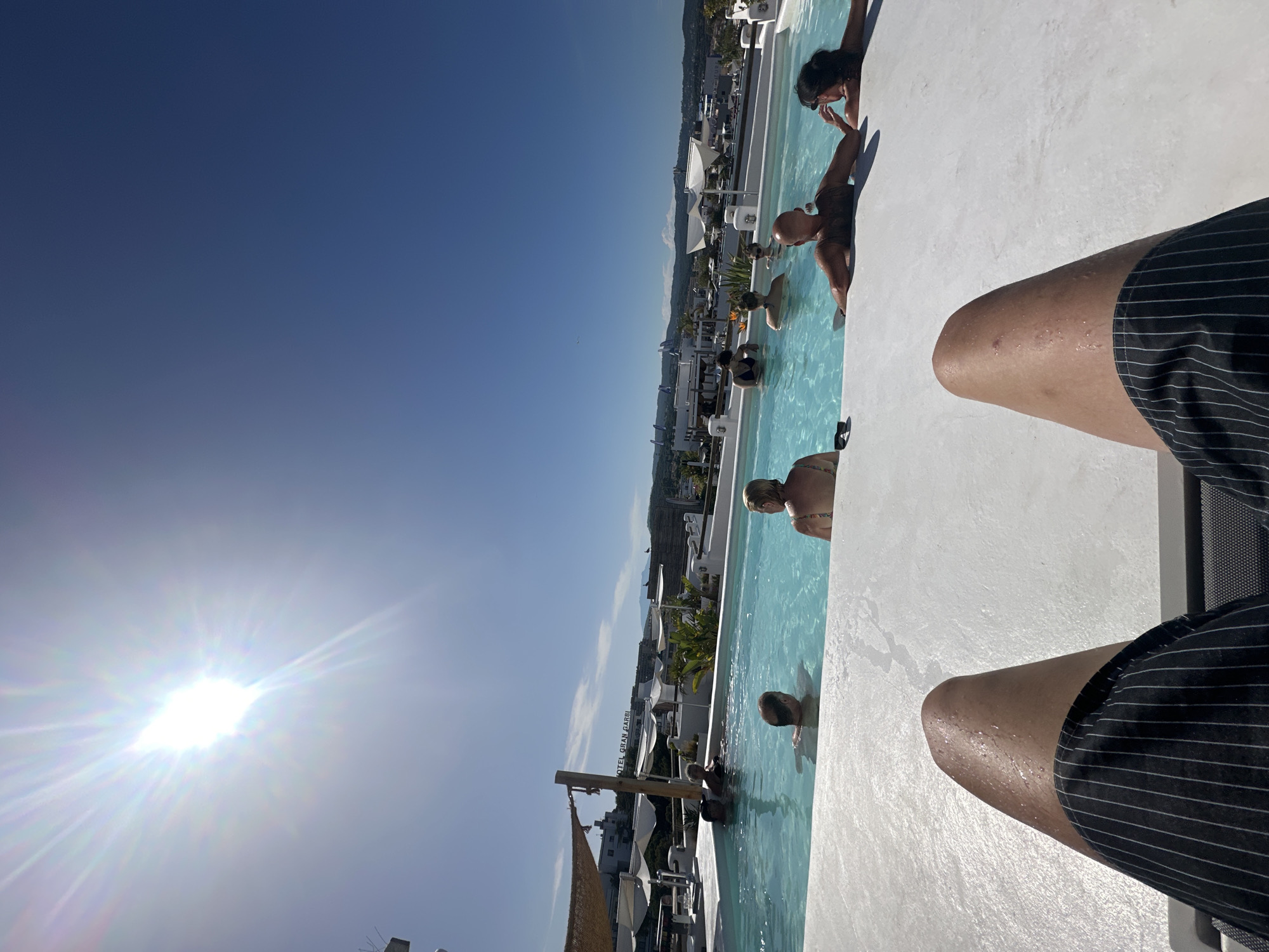 Poolside downtime at a Lloret de Mar resort on a sunny afternoon