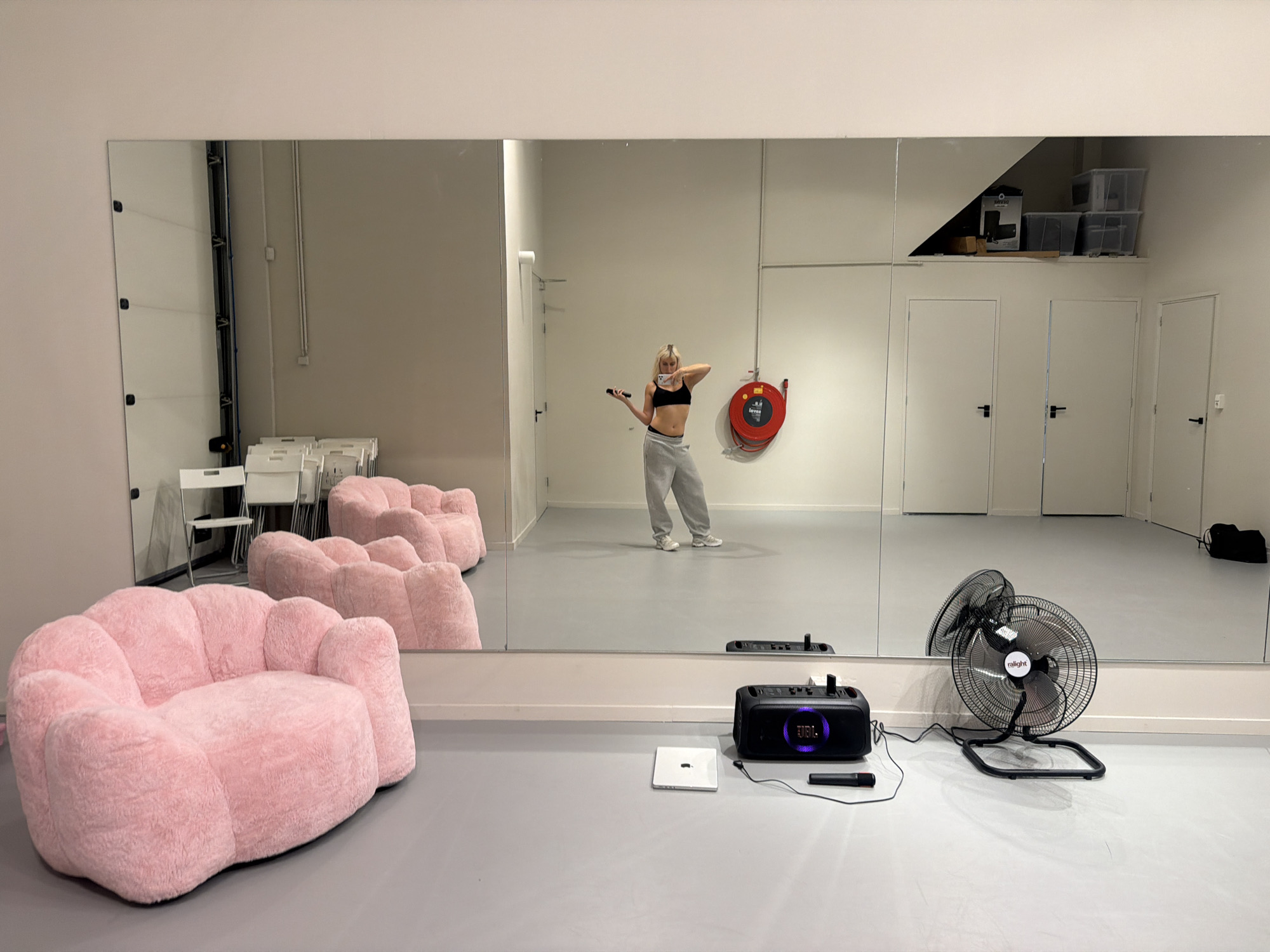Mirror selfies in an Amsterdam dance studio during a workout session