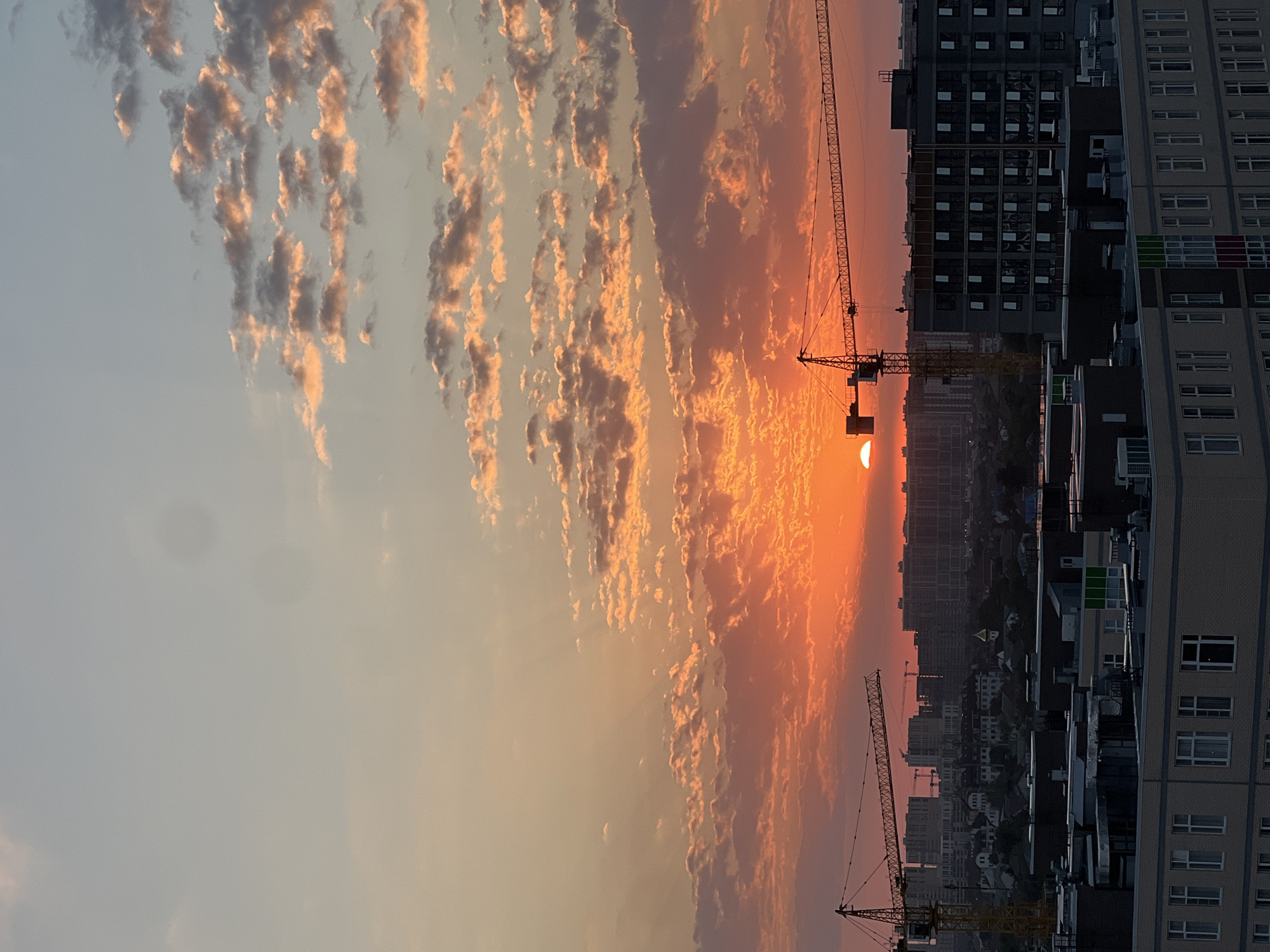 Krasnodar skyline glows at sunset amid active construction
