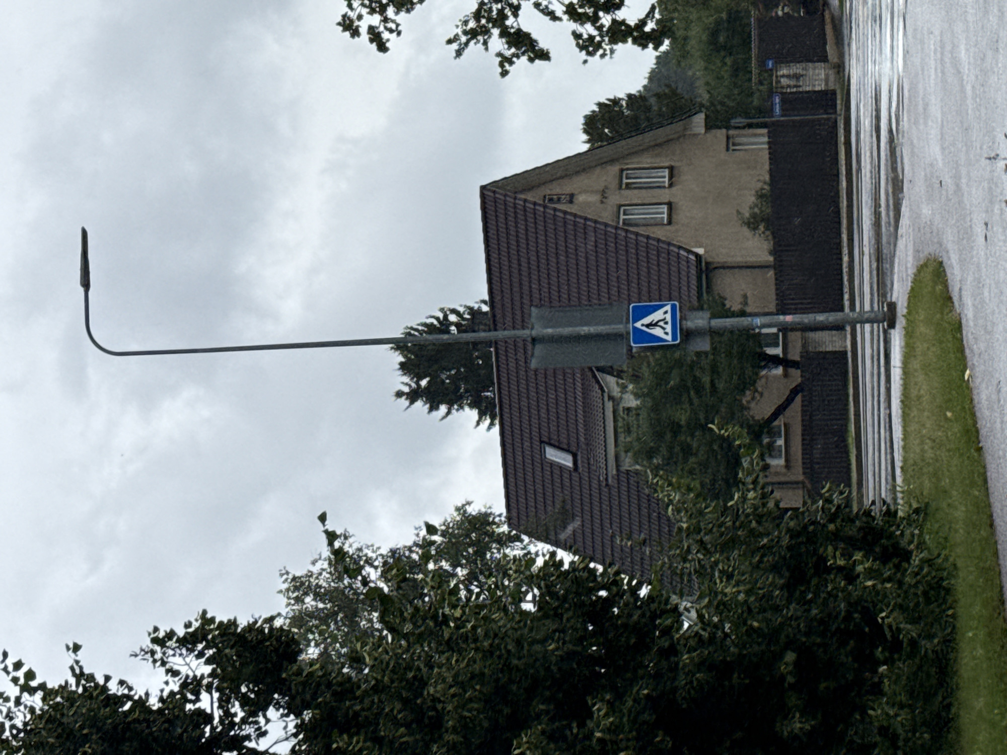 Tallinn neighborhood: parks, apartments, and an abandoned brick building