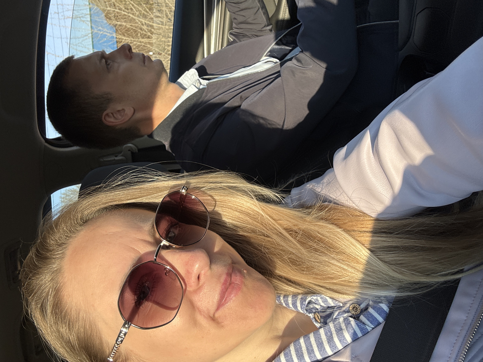 Two people photographed inside vehicle in Chaikovsky, Russia