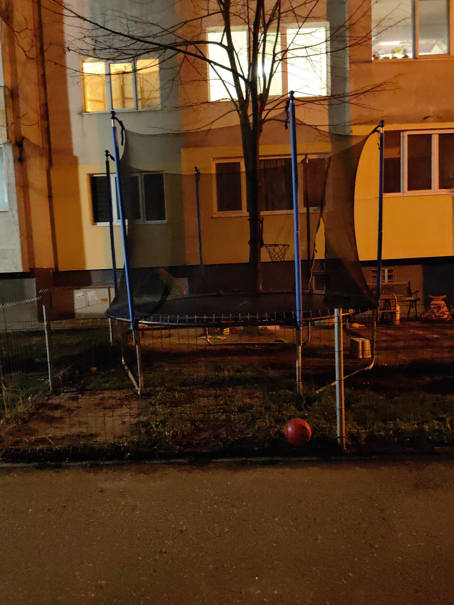 Nighttime trampoline setup documented in Sofia courtyard