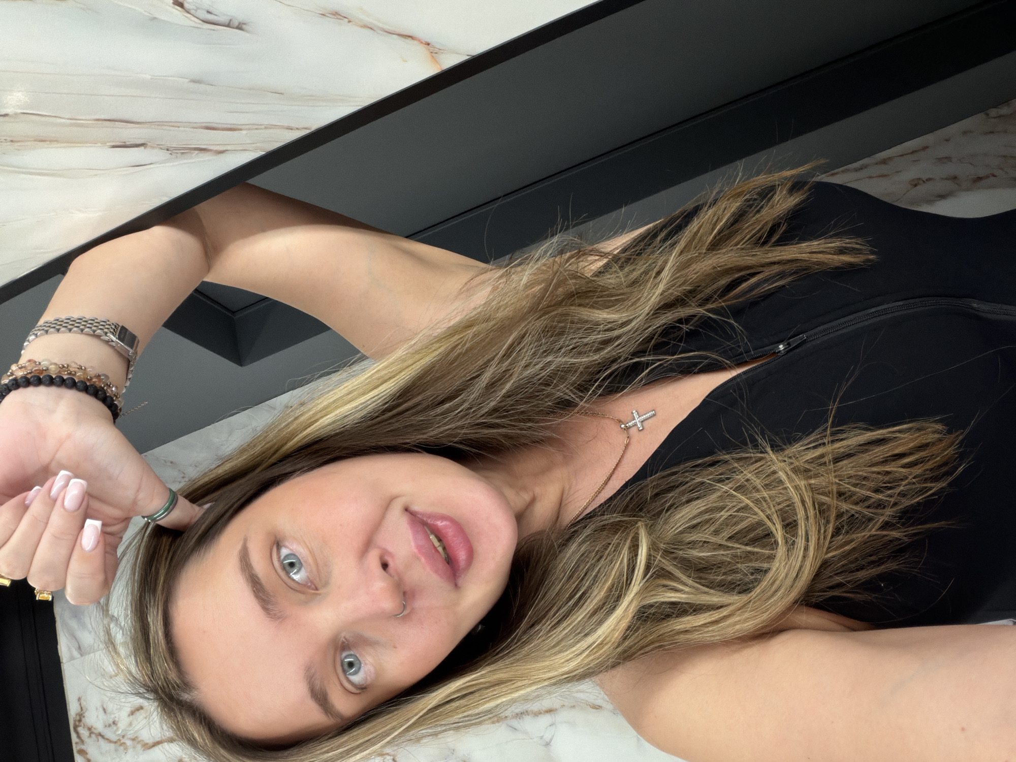 Woman photographed in marble bathroom settings in Moscow
