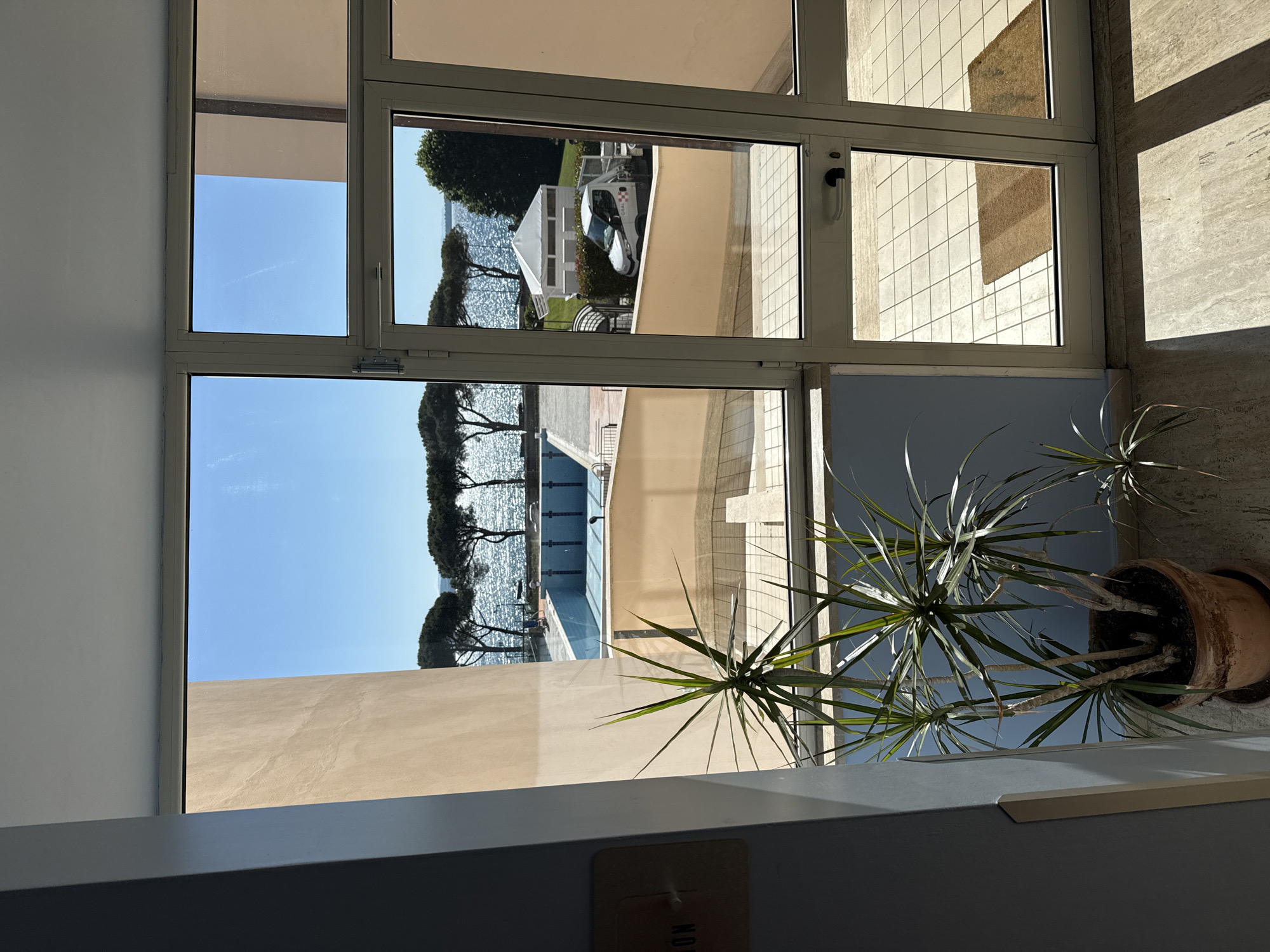 Morning lake view captured from building window in Bracciano