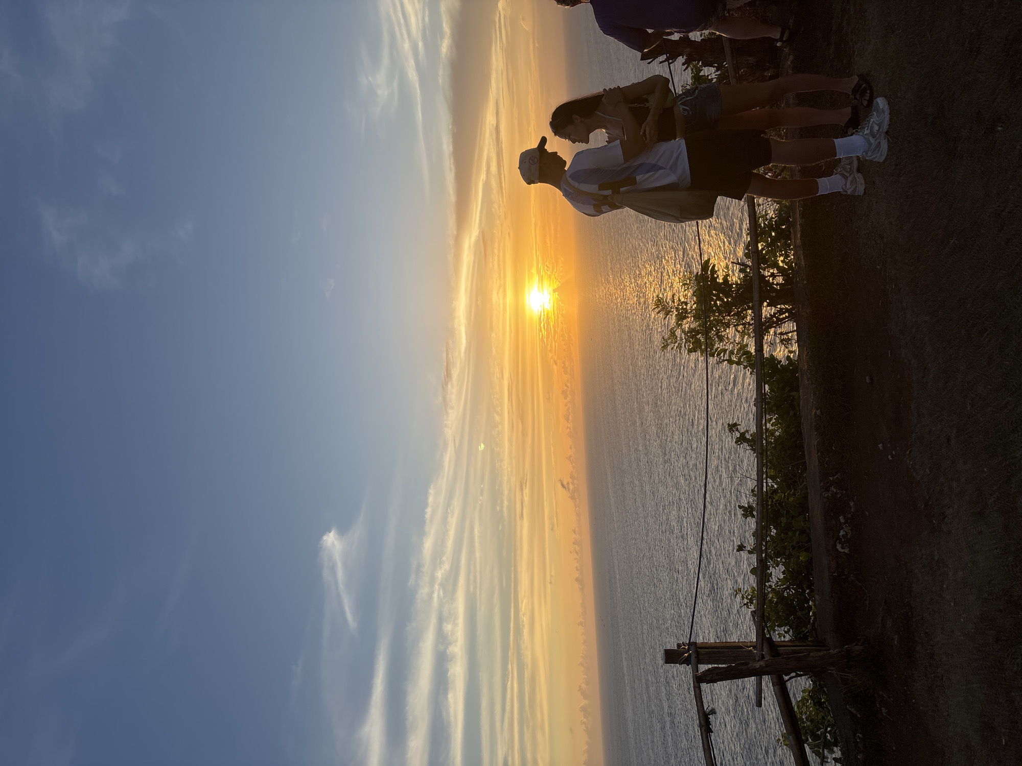 Tourists gather at Kuta Selatan clifftops for ocean viewing