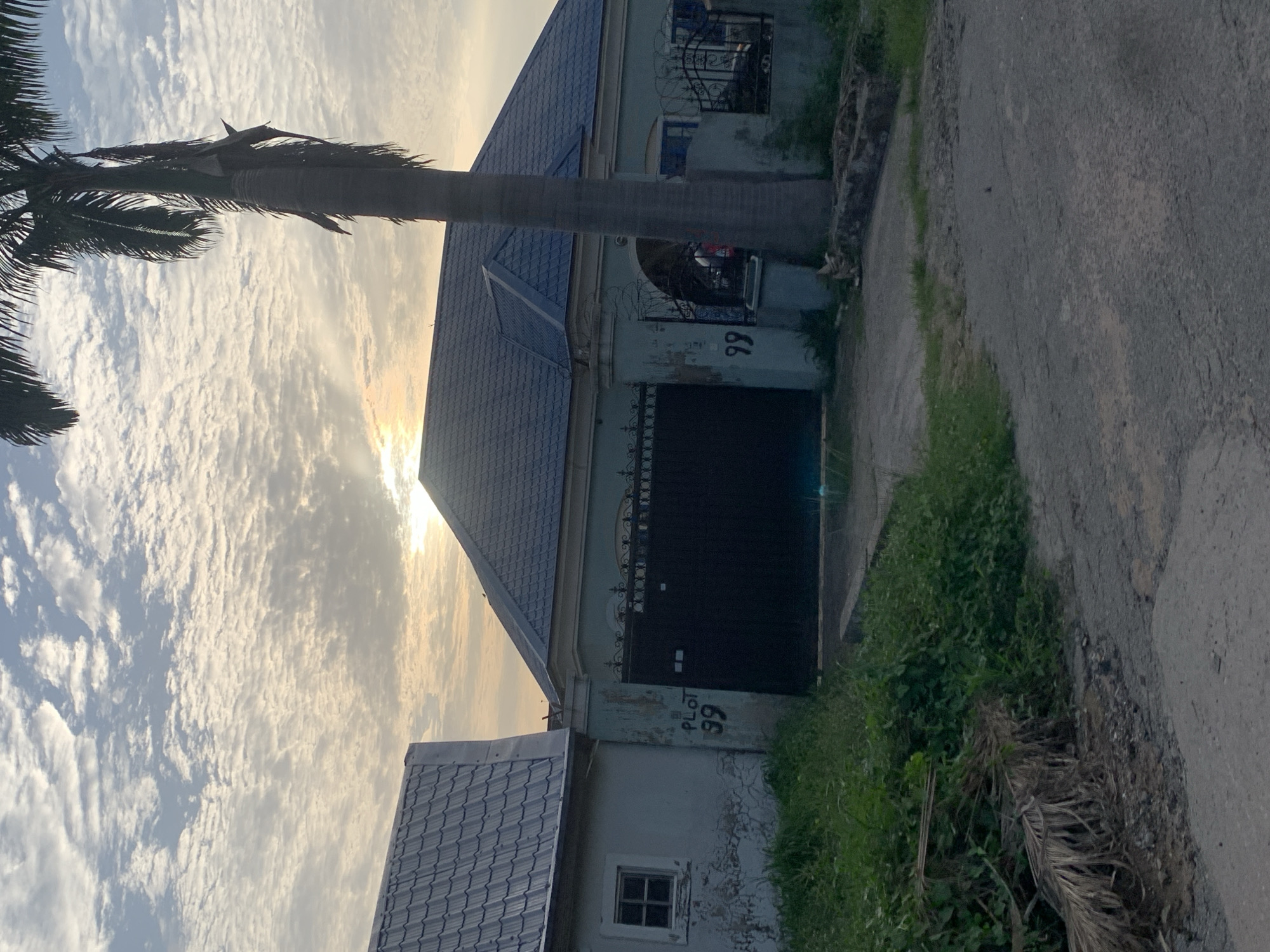 Routine afternoon street life documented in Abuja residential area