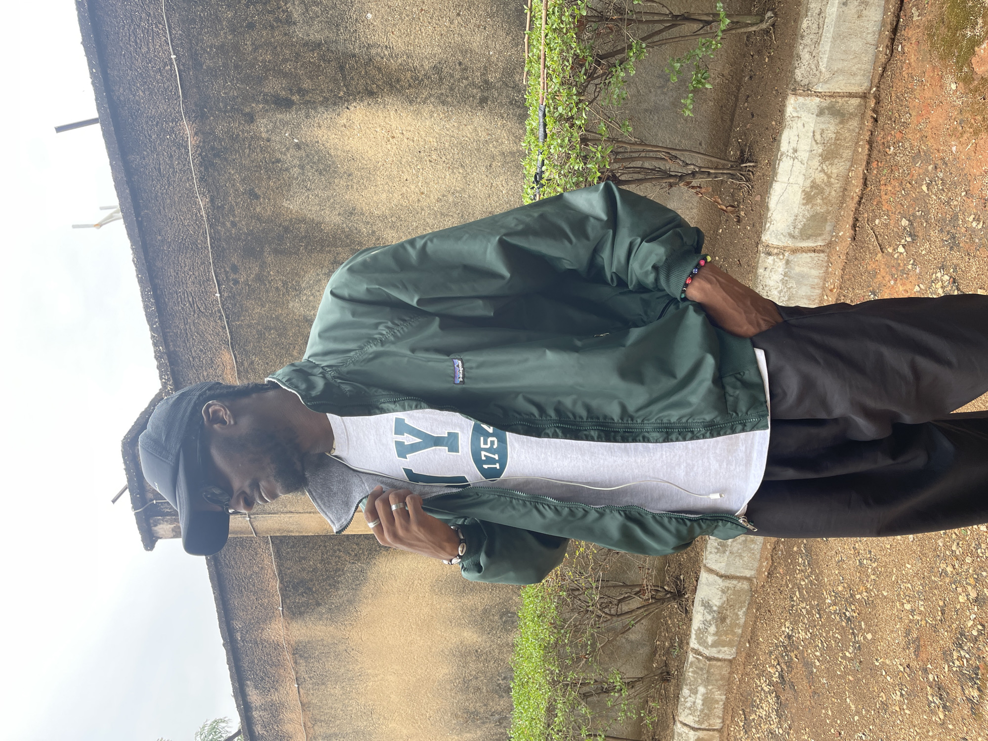 Person spotted outdoors in Jos, Nigeria wearing casual attire