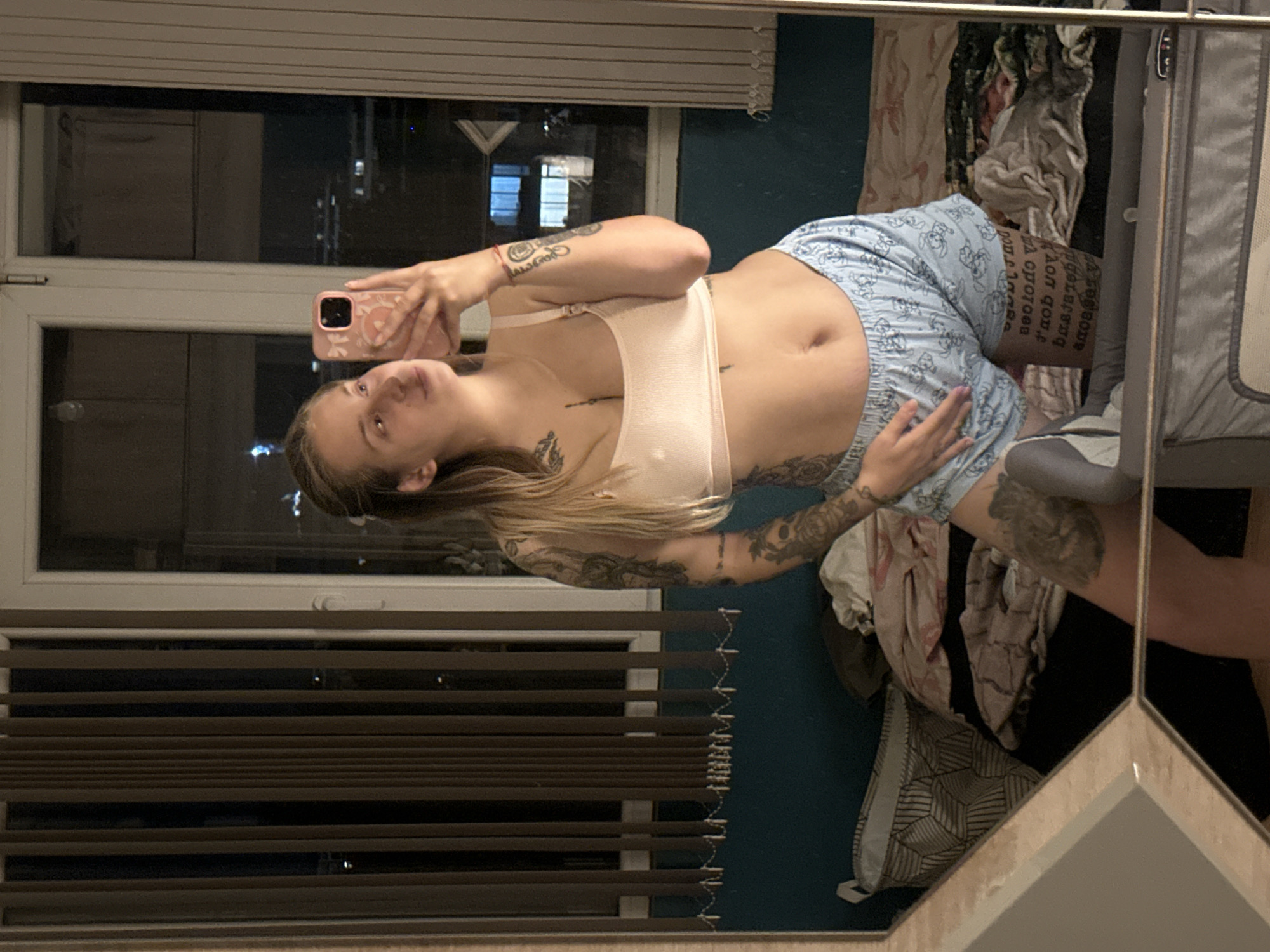 Mirror selfie session in a turquoise bedroom, Plovdiv