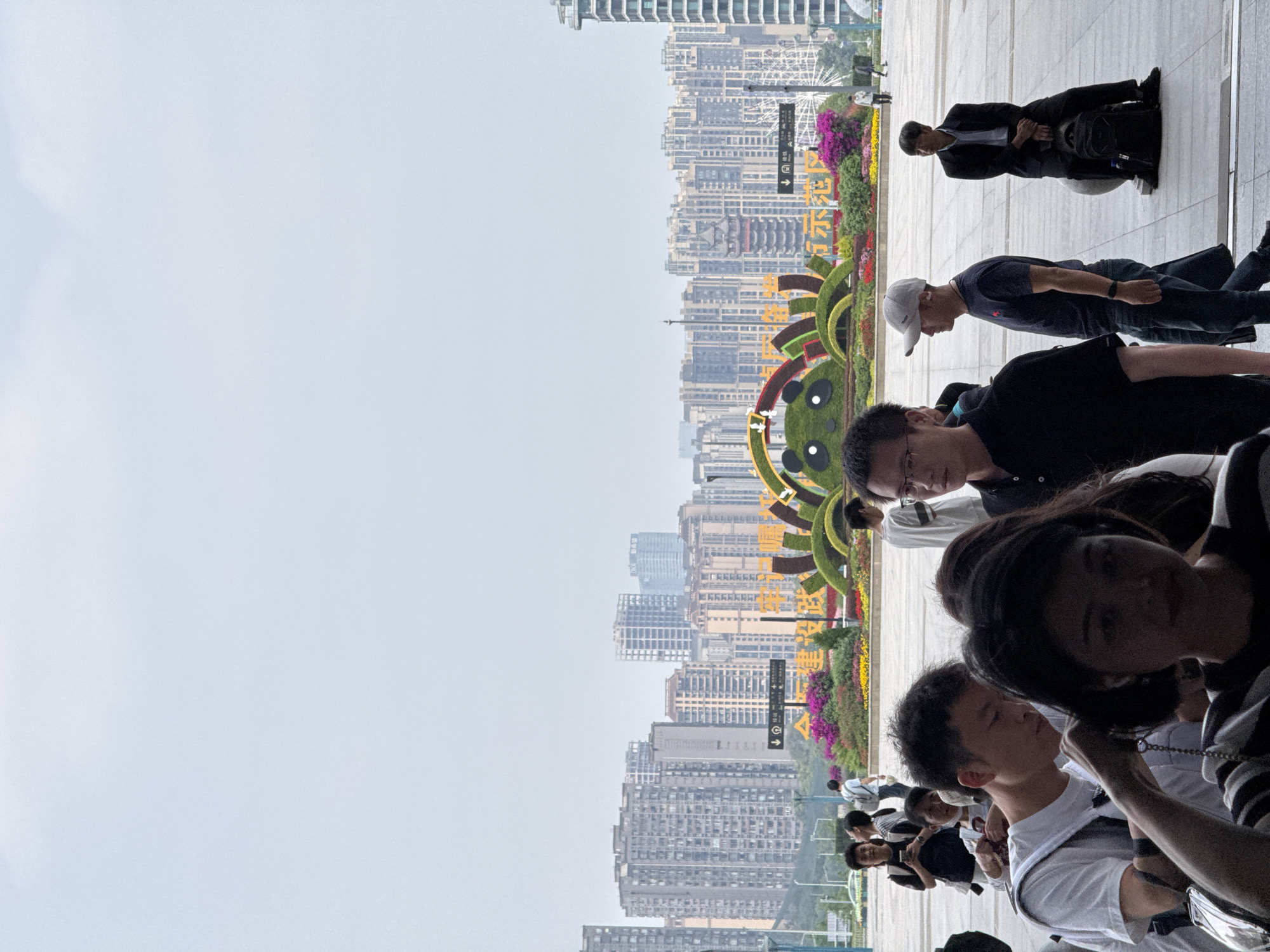 Group gathers on walkway in Chenghua District