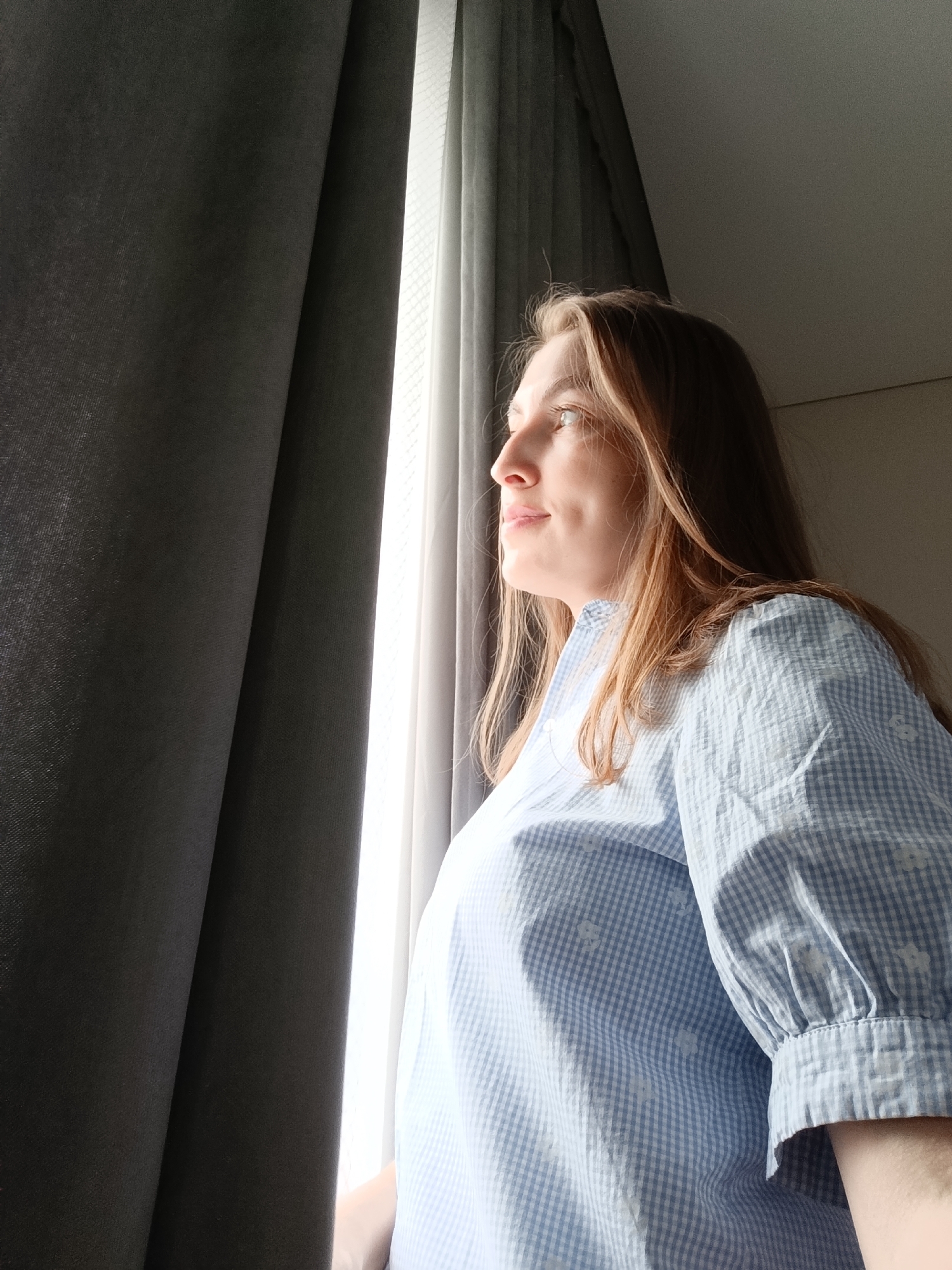 Woman photographed in casual indoor moments in Chaikovsky home