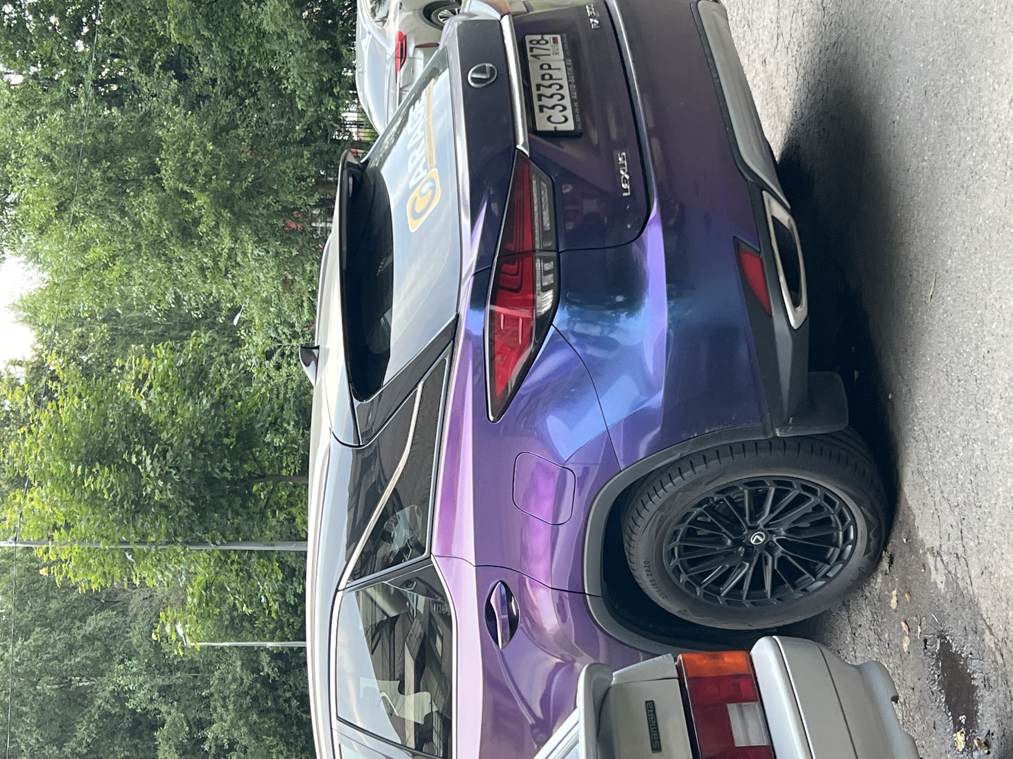 Coffee shop visit in St. Petersburg with a flashy Lexus outside