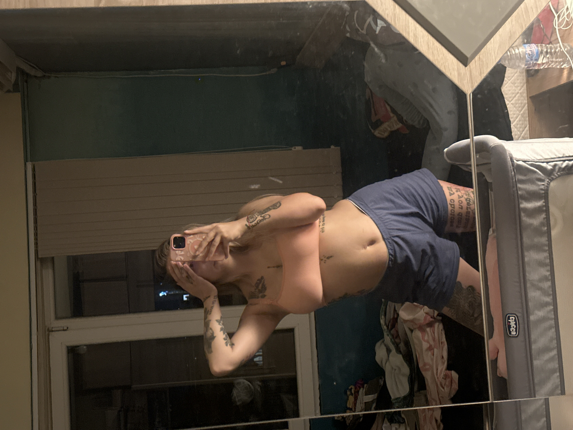 Tattoo-focused mirror selfies from a Plovdiv apartment.