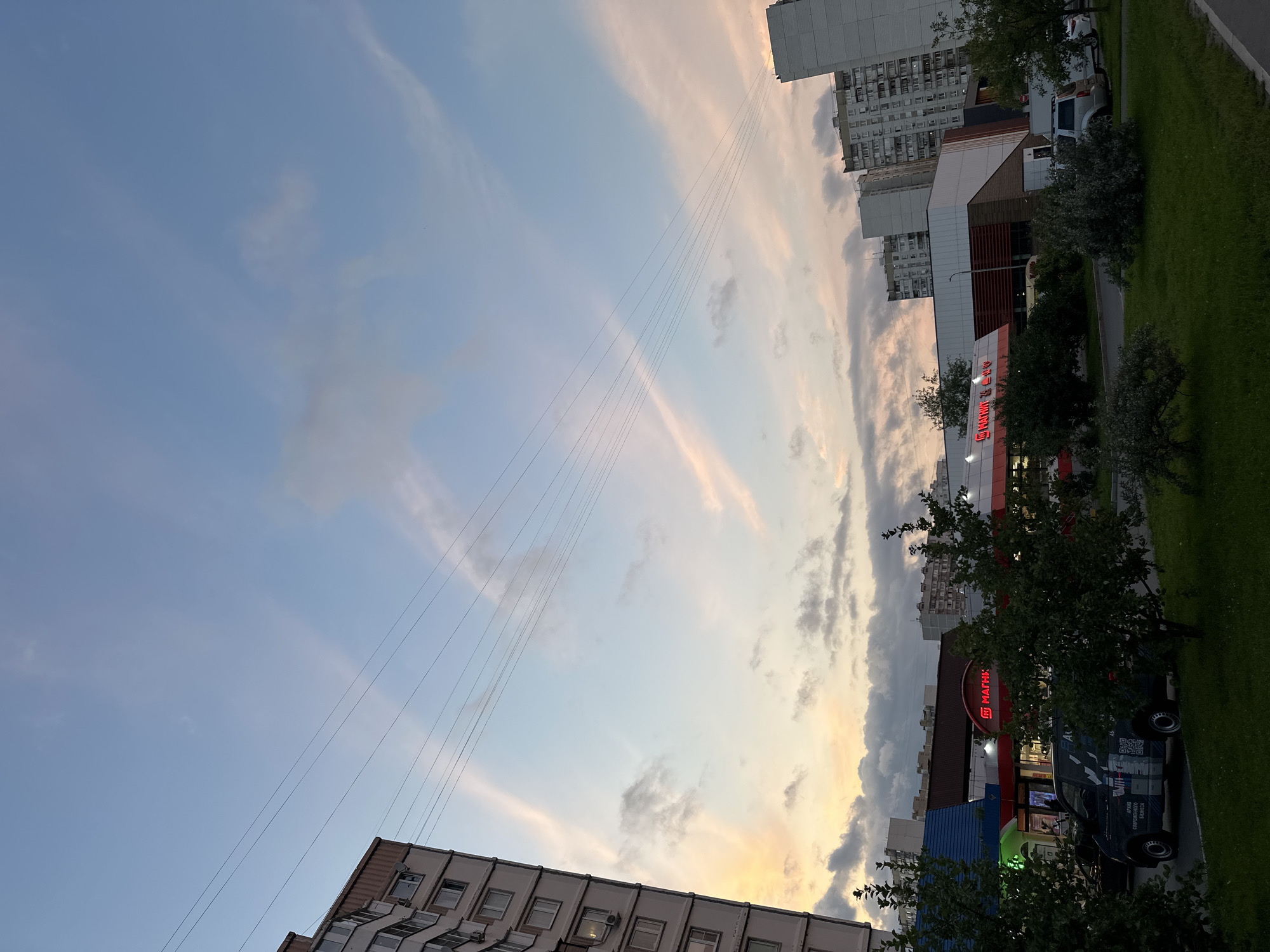 Moscow residential streets at golden hour, July 2026