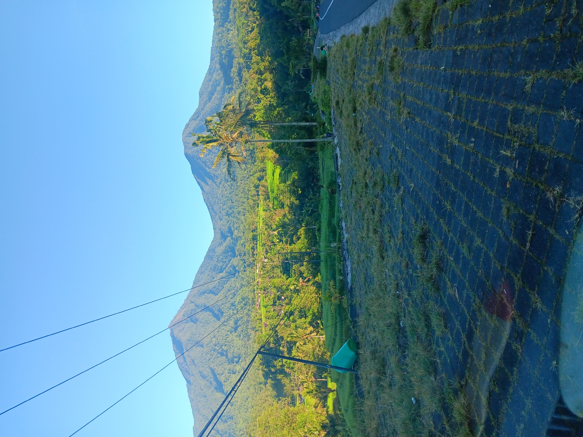 Scenic landscape photographed in Penebel, Indonesia showing mountains, terraces