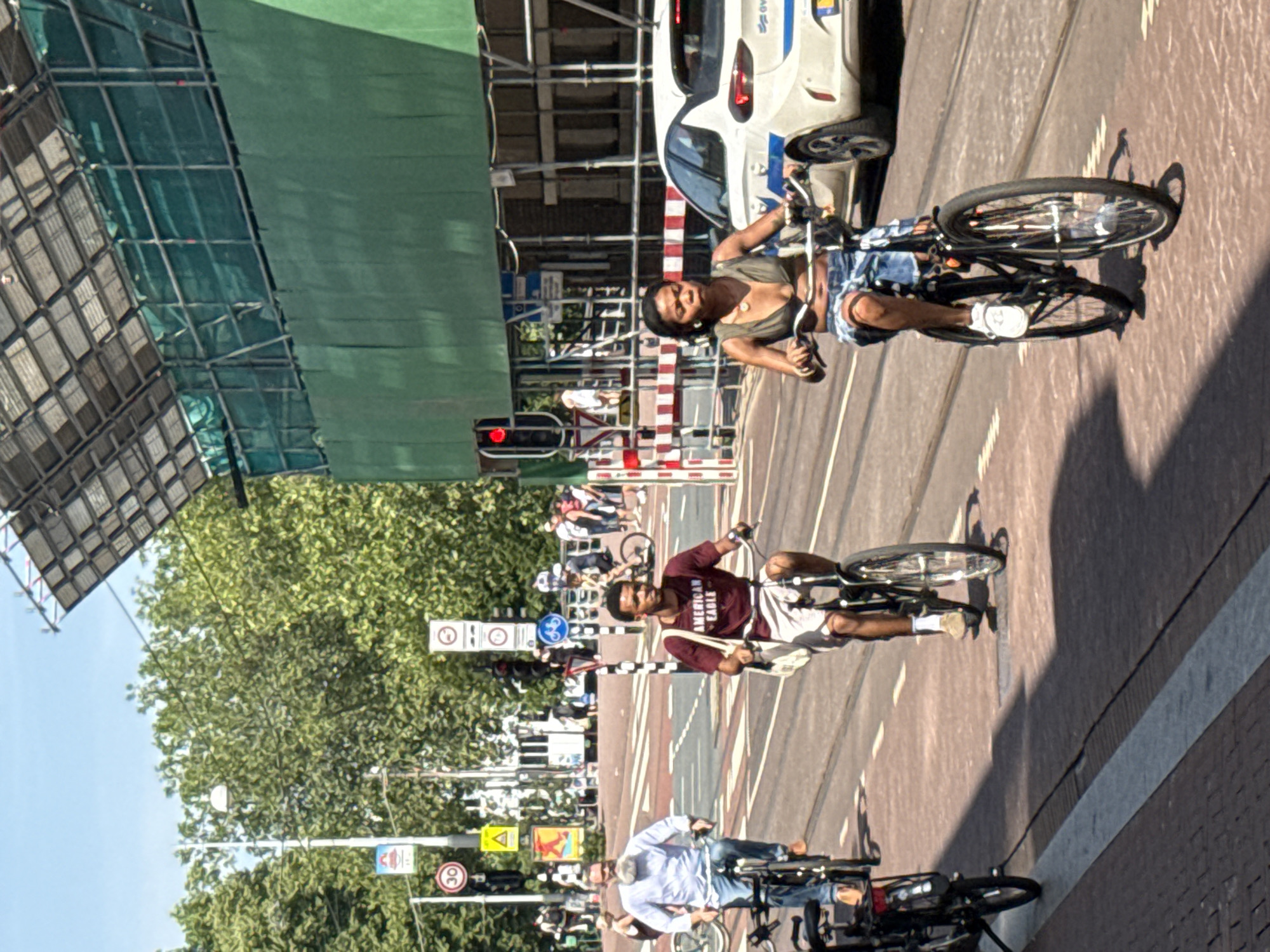 Amsterdam on a sunny afternoon, streets and canals in motion