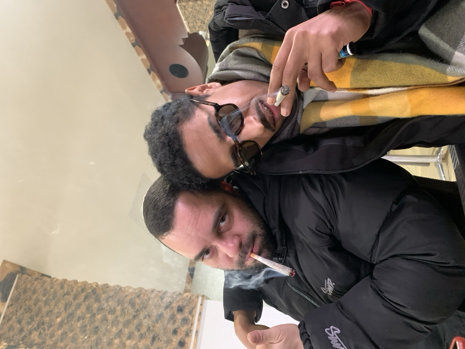 Social gathering and kitten documented in Khandek Zarzour, Morocco