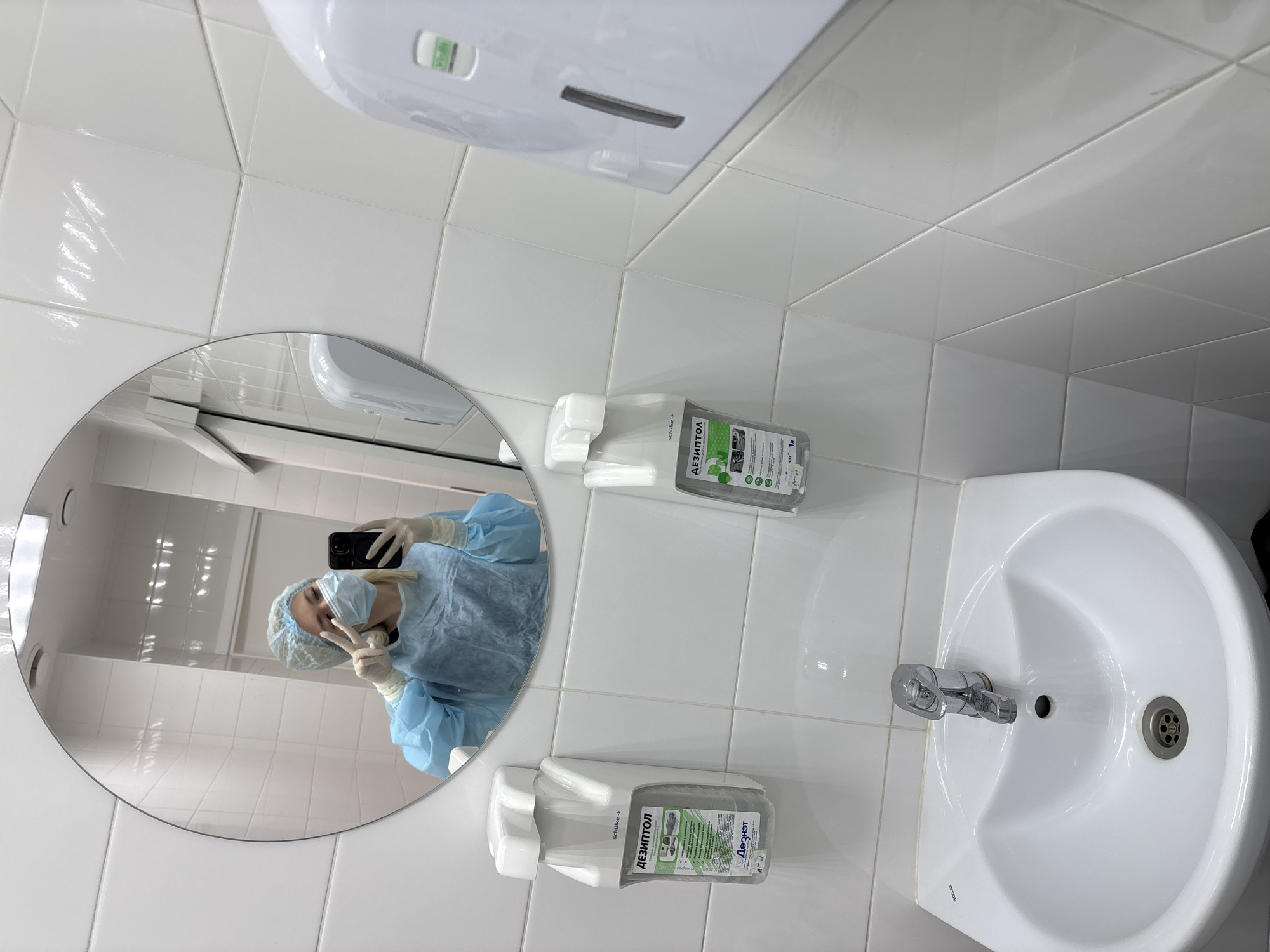 Medical worker takes selfie in surgical scrubs in Izhevsk