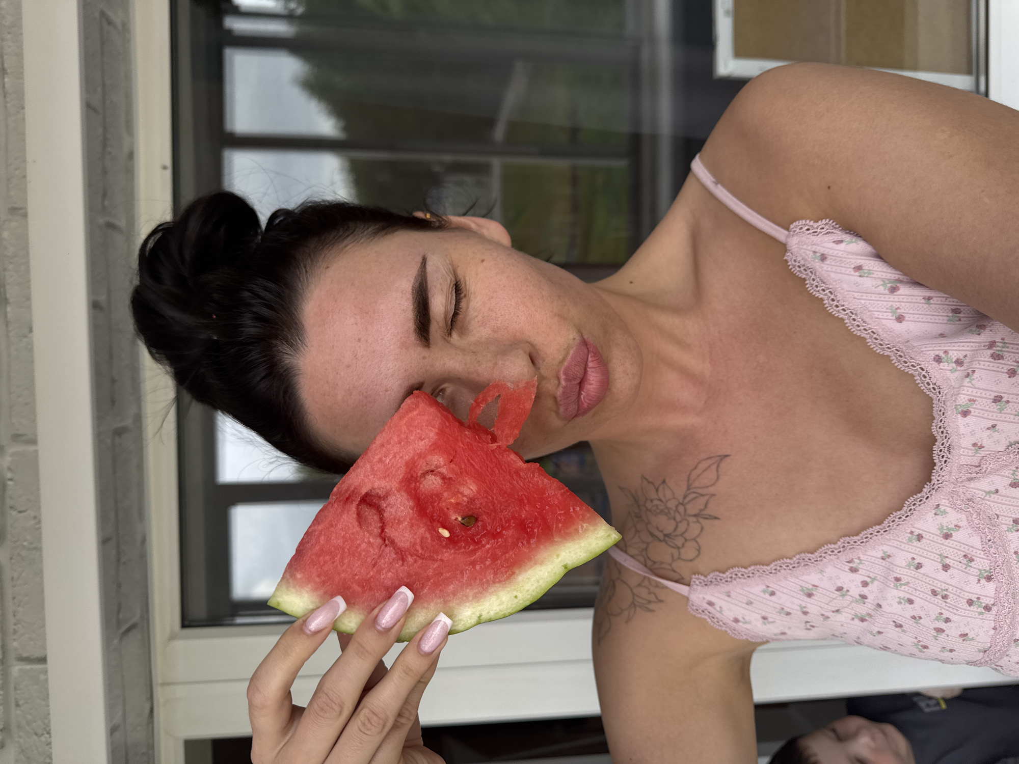 Family shares watermelon, playtime in Chaikovsky home