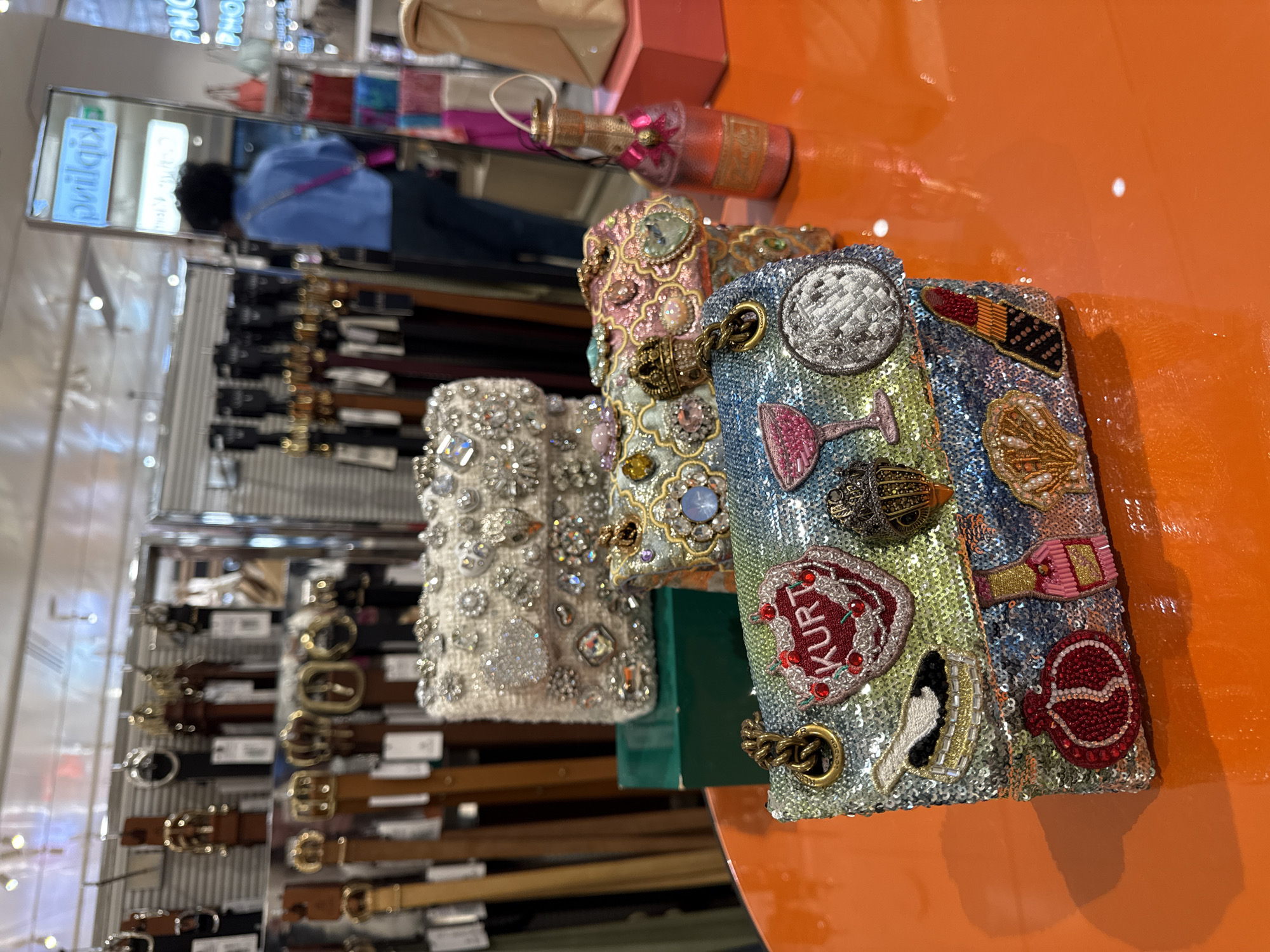 Evening scenes captured across Barcelona including retail displays, architecture