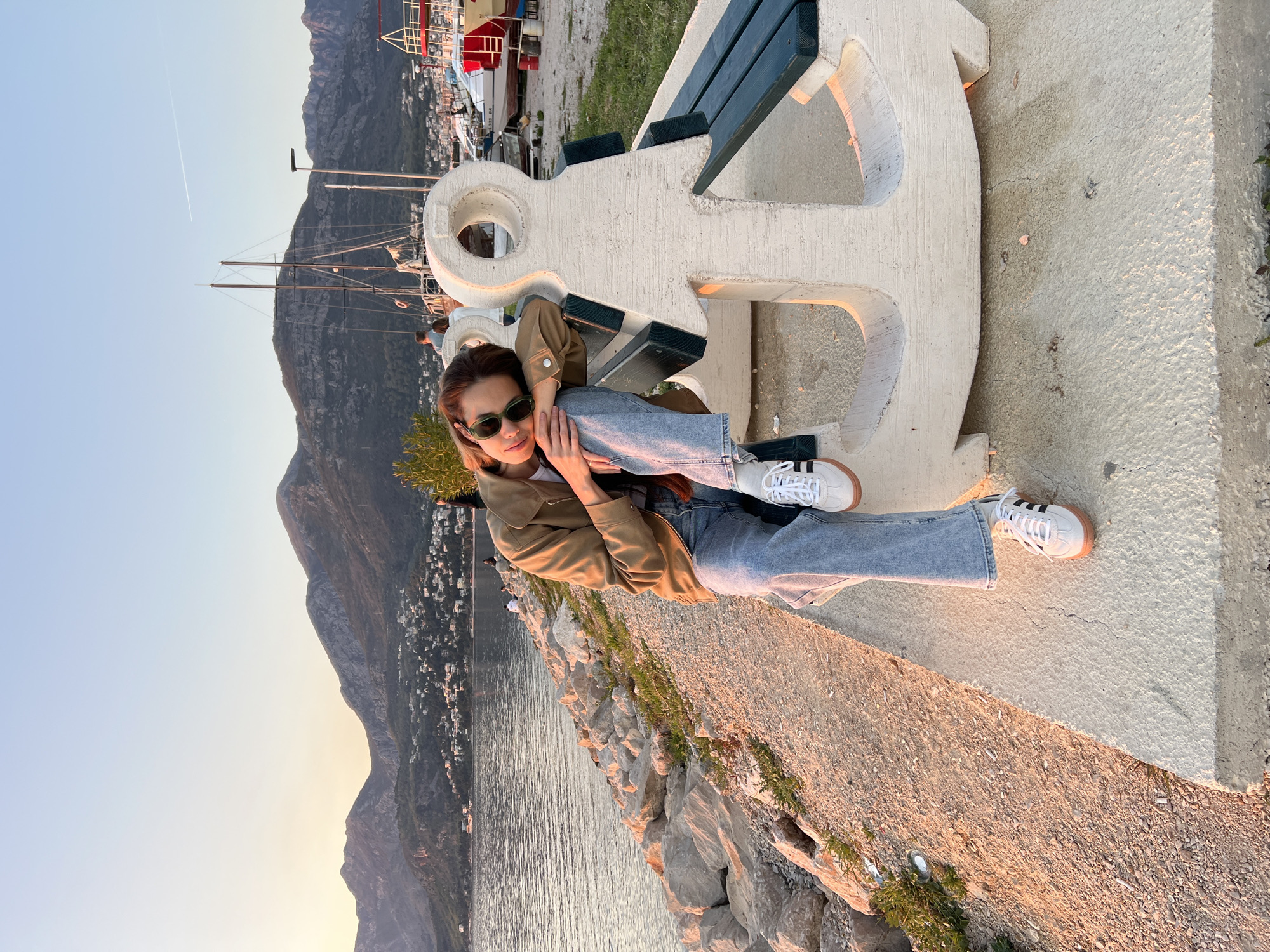 Woman explores Bar Montenegro marina and waterfront attractions