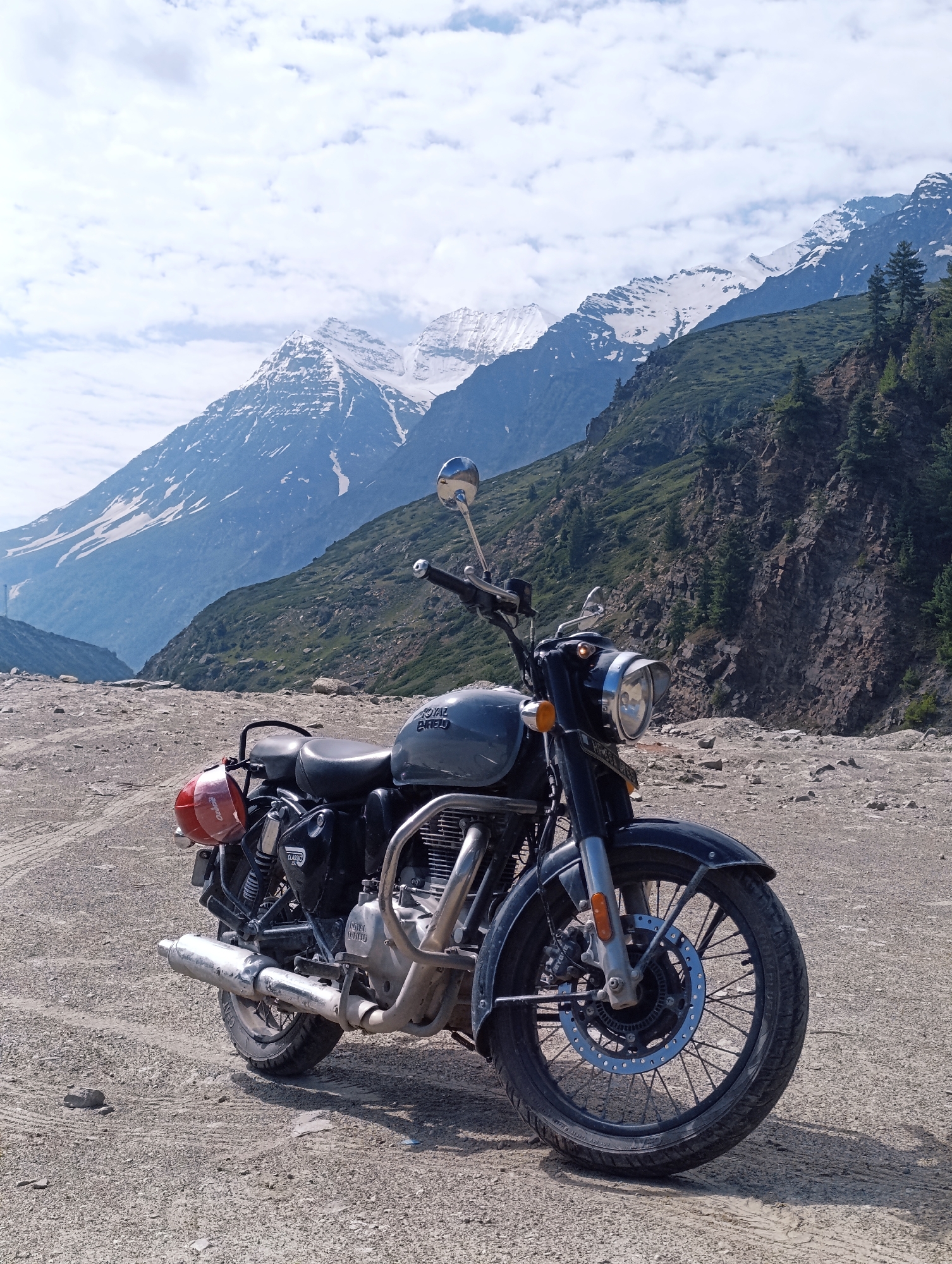 Royal Enfield parked mid-ride through Lahaul Valley, Sissu