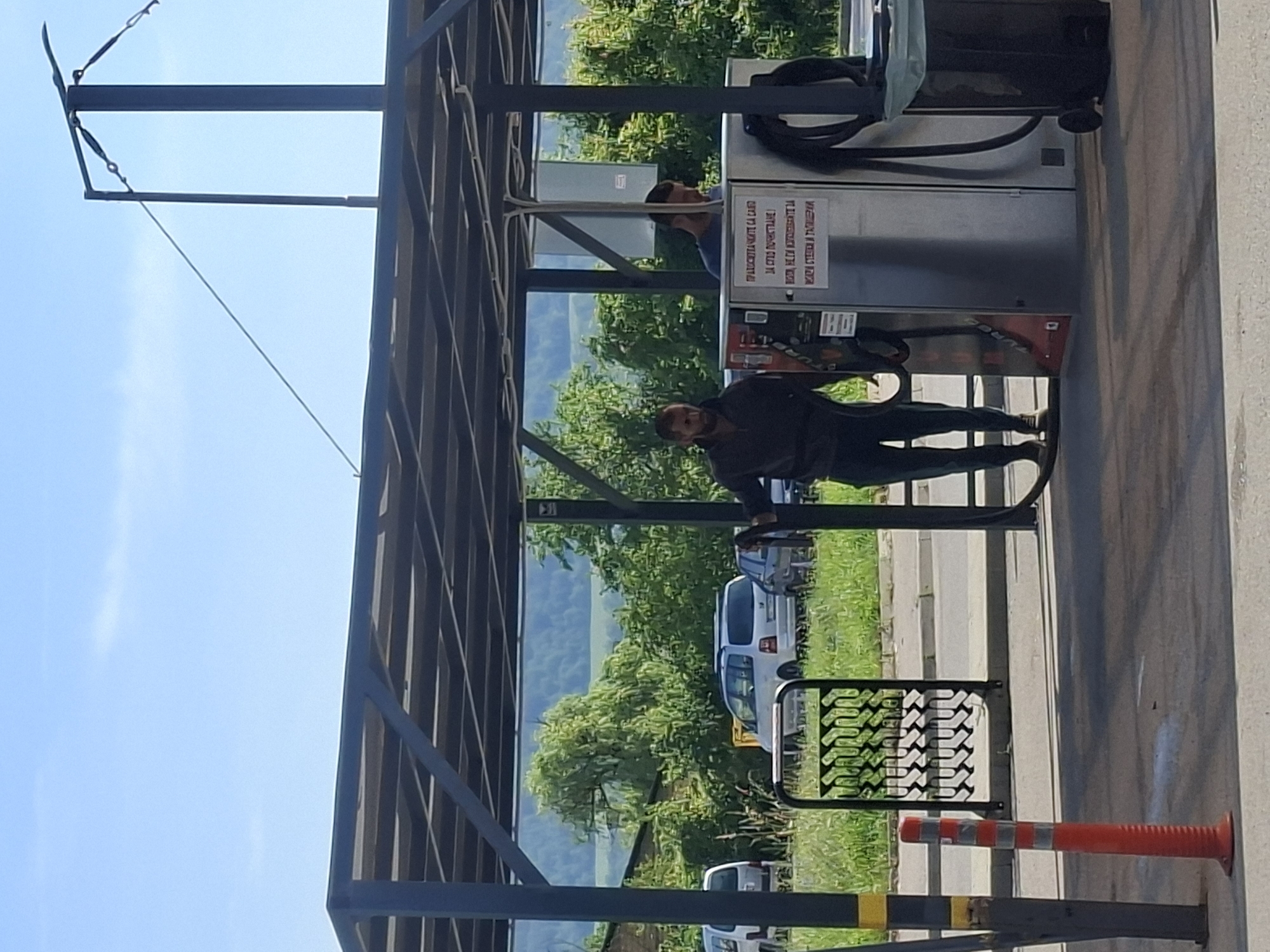 Gas station refueling and garage scenes documented same location