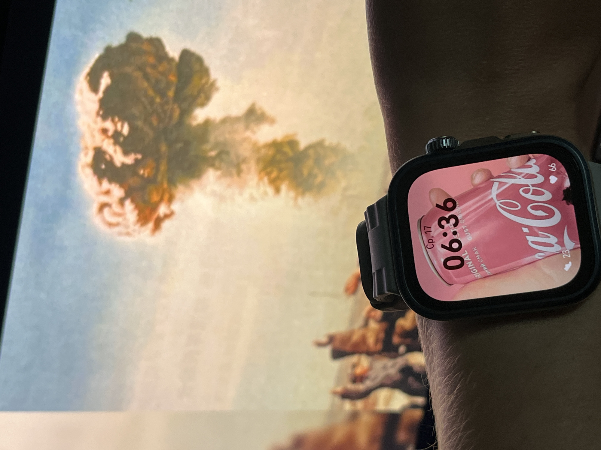 Smartwatch, nuclear cloud backdrop, and a plush lamb in St. Petersburg