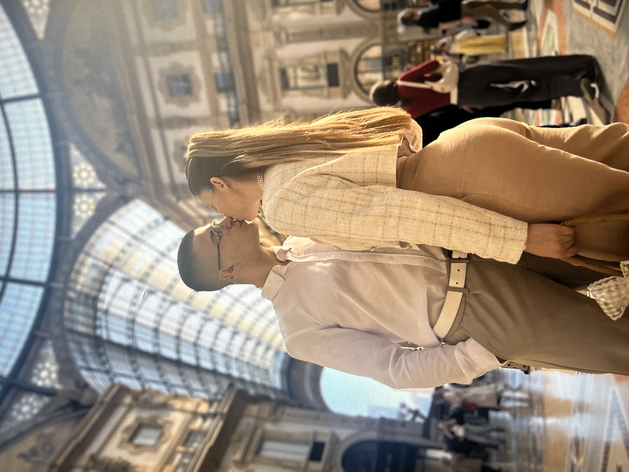 Couple shares intimate moment in Milan's historic Galleria