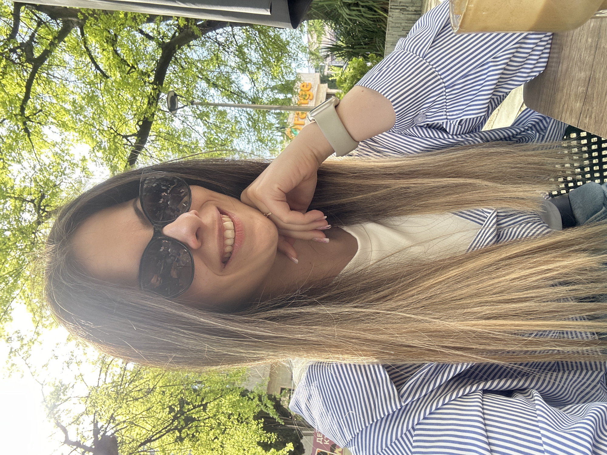 Woman enjoys coffee selfie moment in Bulgarian city