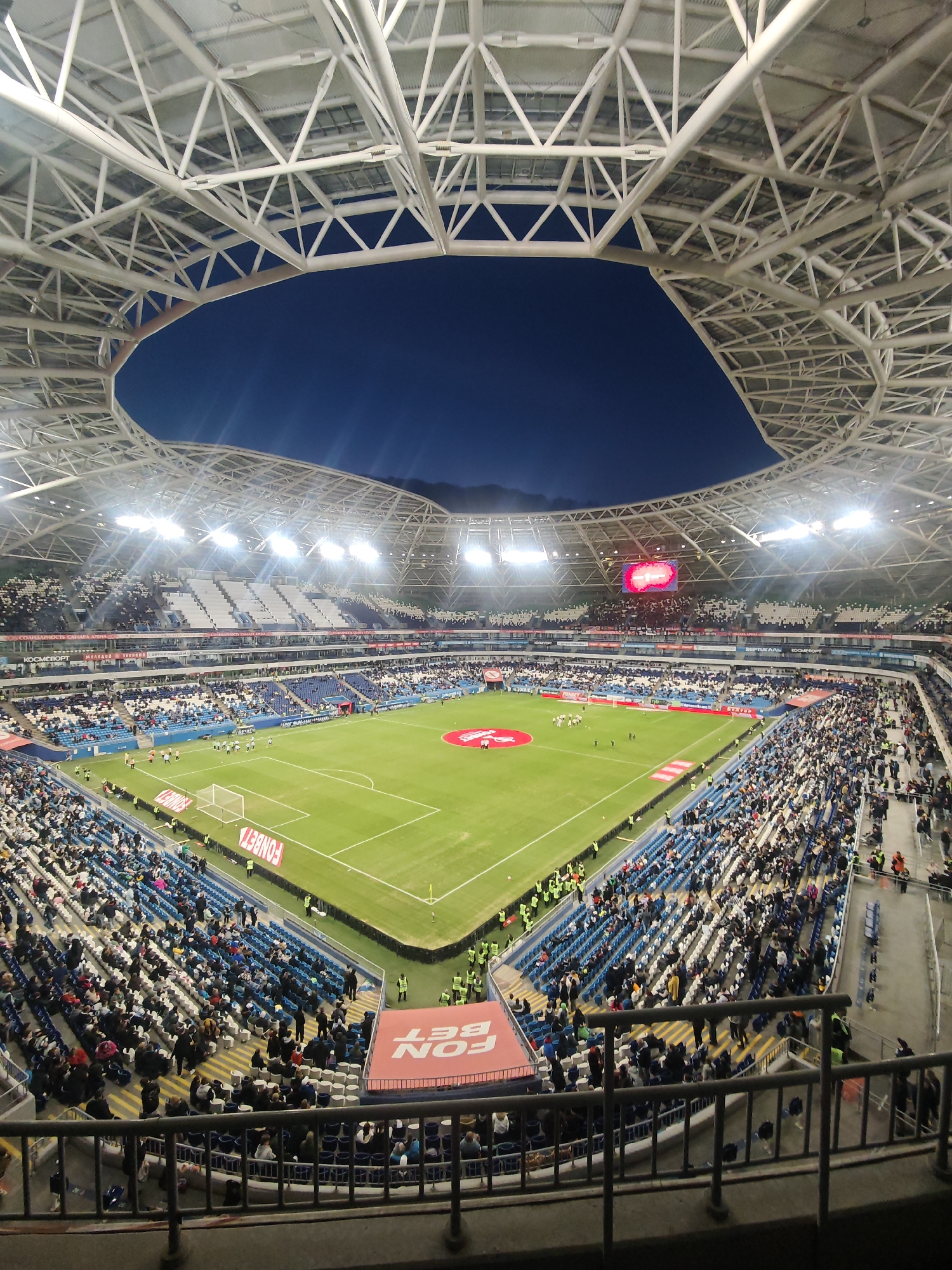 Nighttime soccer match draws packed crowd in Novokuybyshevsk stadium