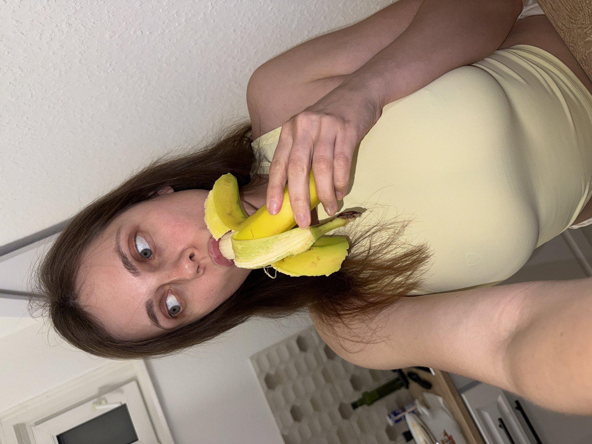 Woman eating banana documented in Hungarian village