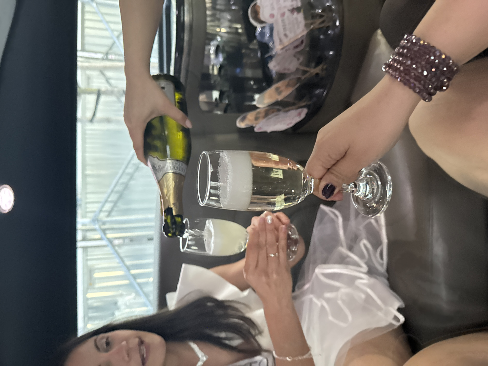 Bride-to-be celebrates with champagne near Sofia cathedral