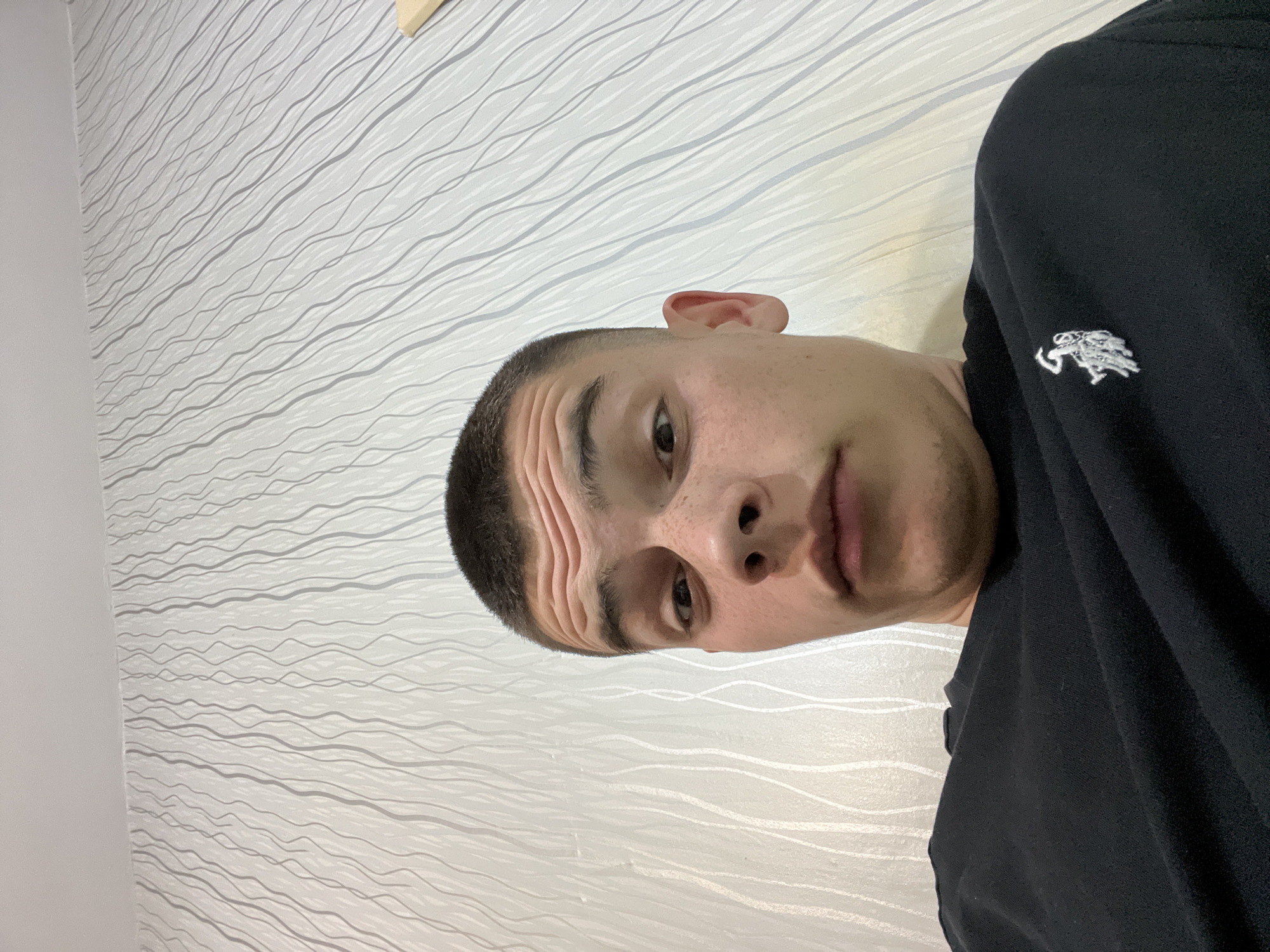 Young man photographed in close-up portrait in Sopot, Bulgaria