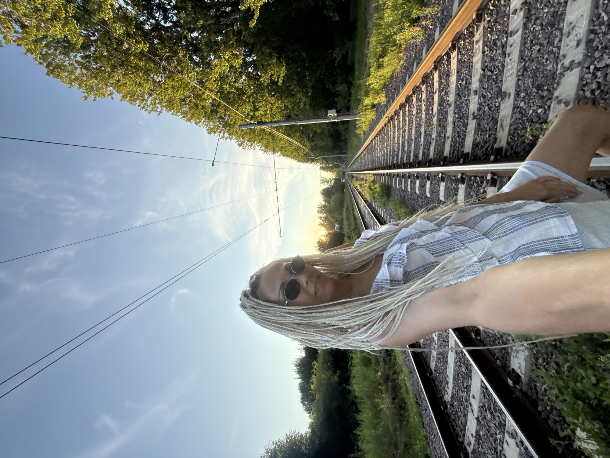 Summer evening in Rusanovo: train tracks, toys, and light portraits