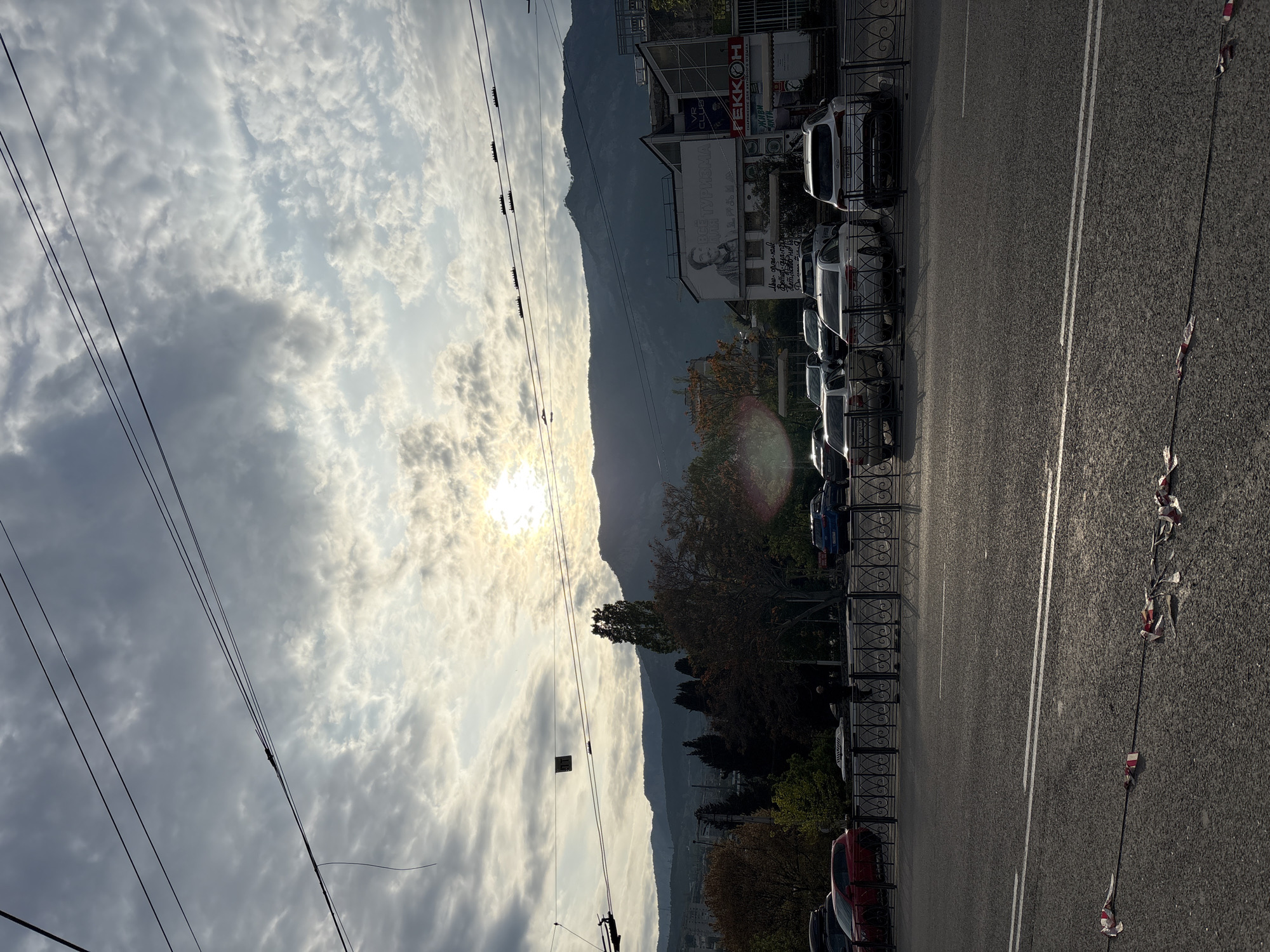 Sunny afternoon street scene documented in Yalta, Ukraine
