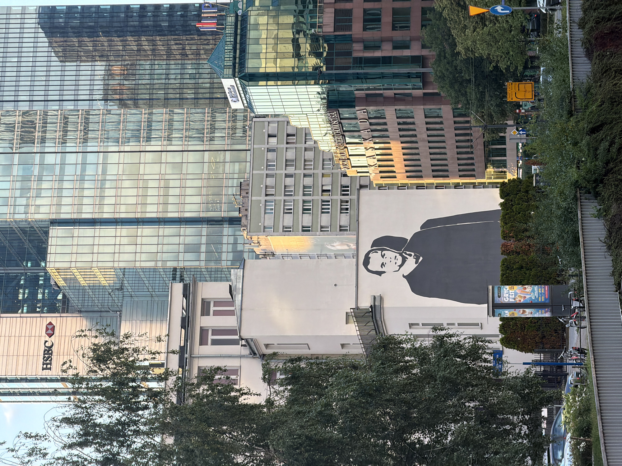 Street art, Soviet-era skyline, and a Warsaw greeting