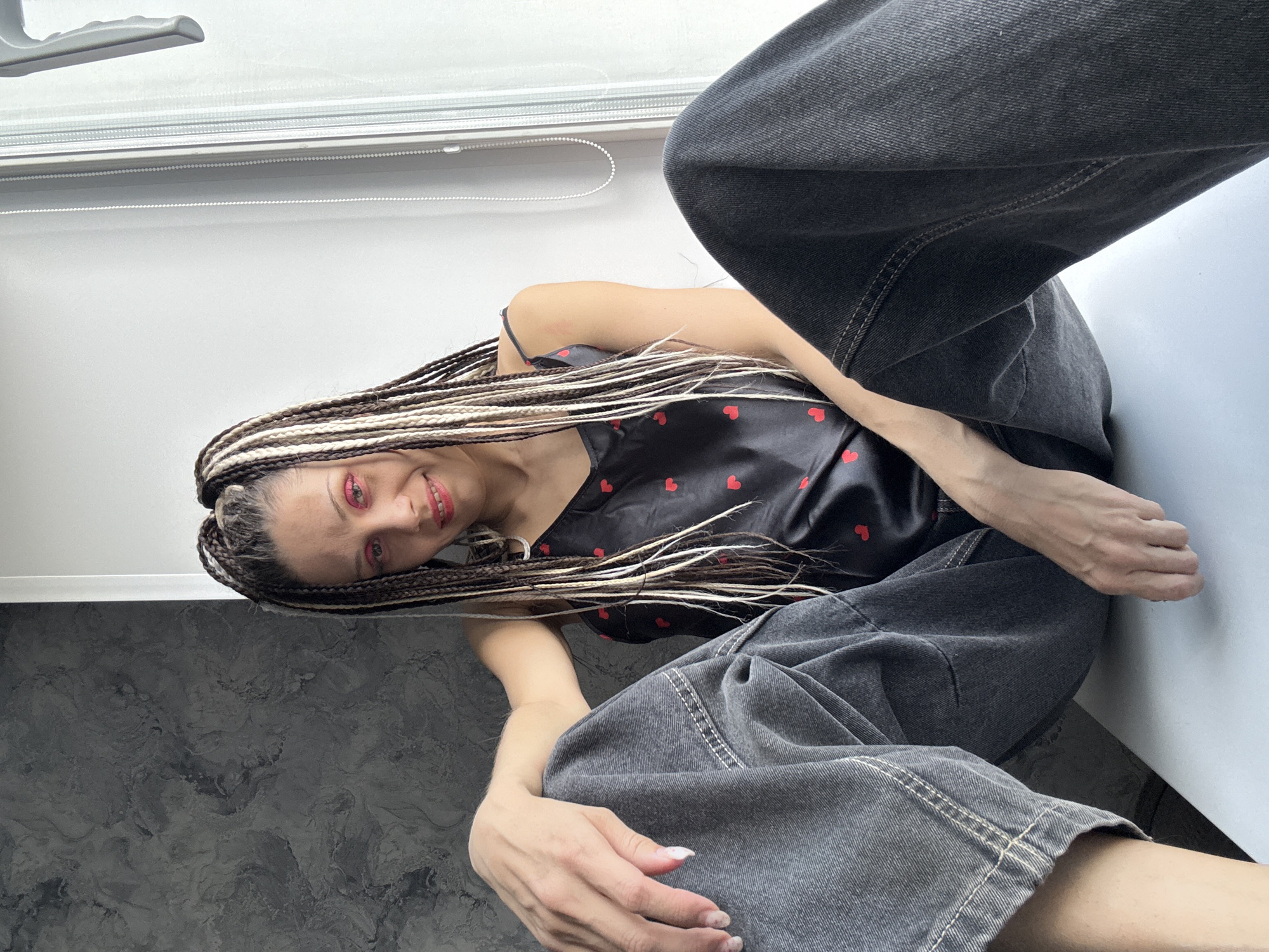Woman poses for indoor photo session in Rusanovo residence