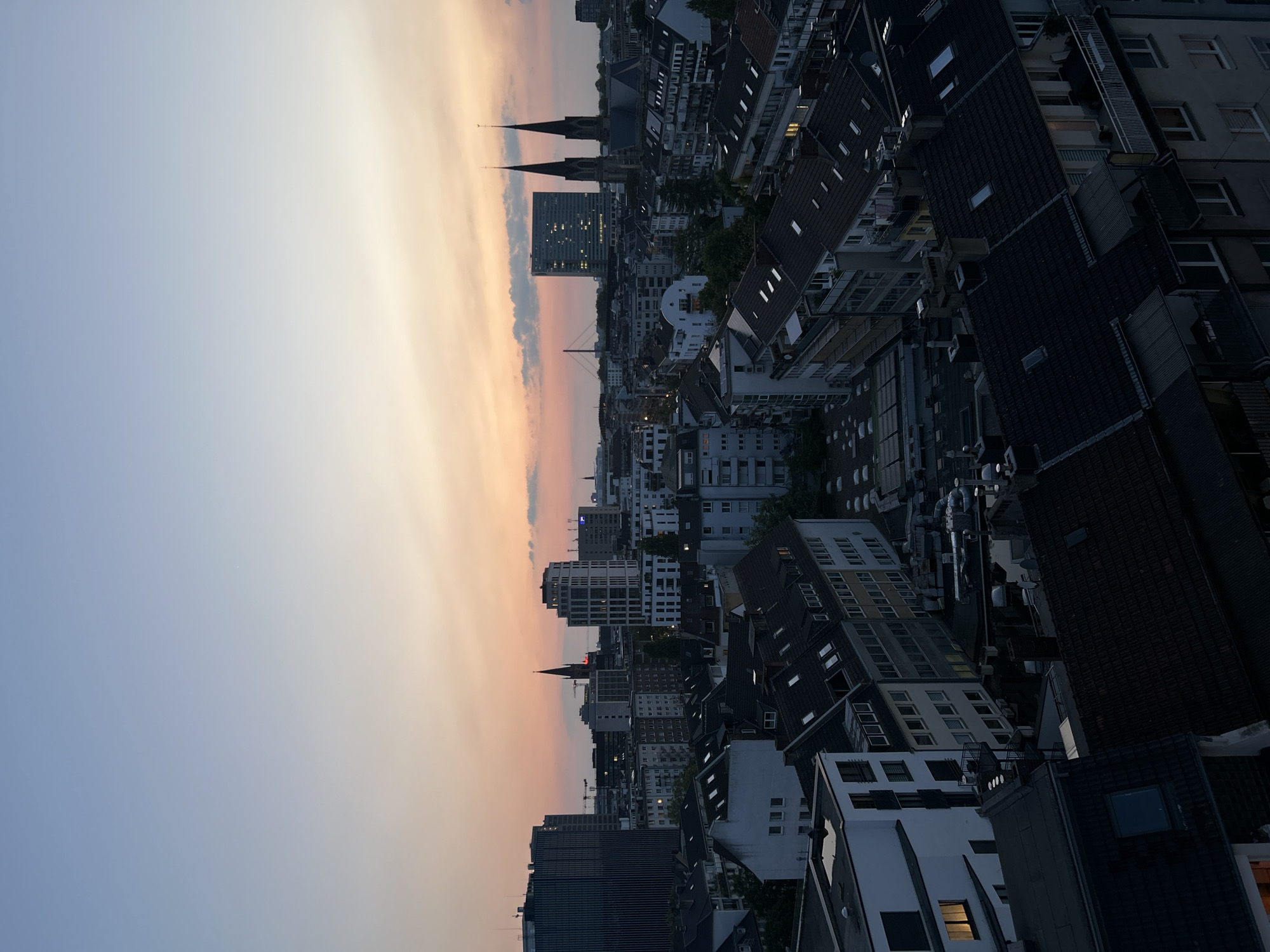 Evening documentation captures Düsseldorf cityscapes and intimate moments