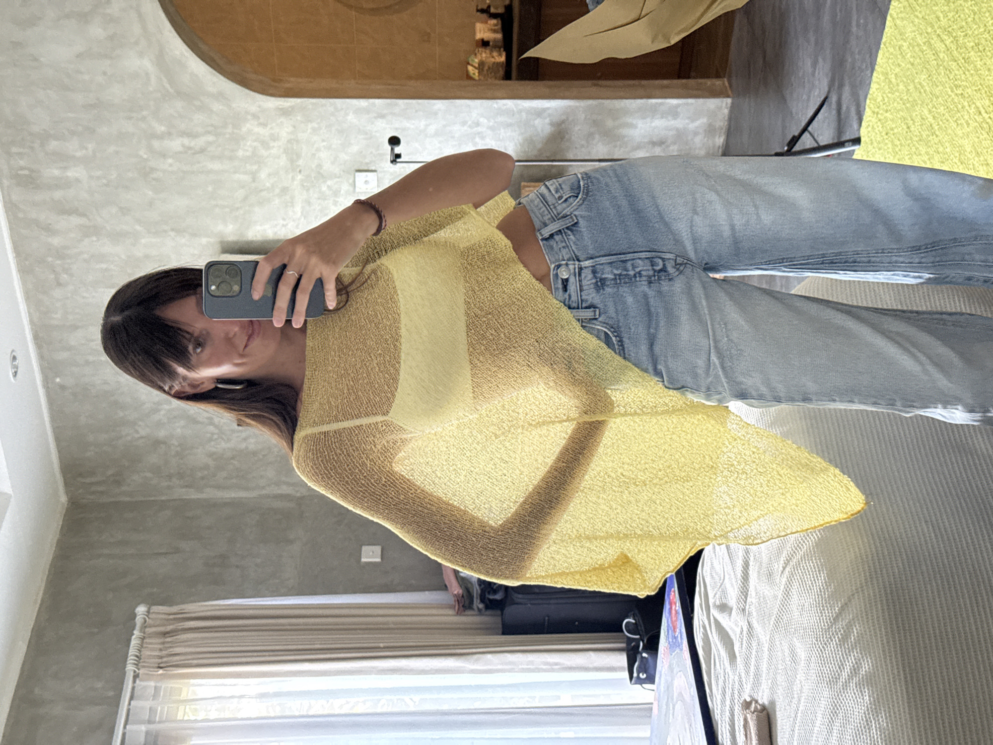Woman takes mirror selfies in North Kuta room