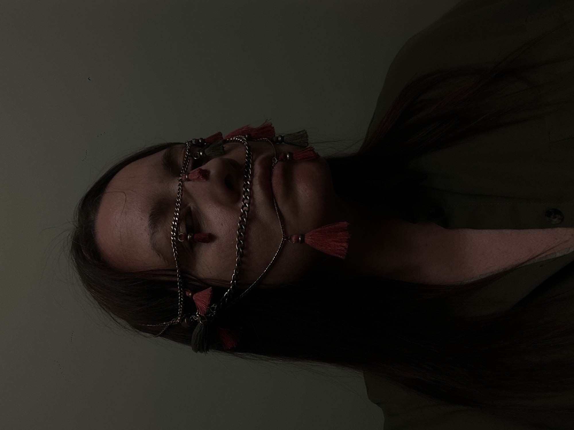 Portrait photograph captured in Riga shows person with jewelry