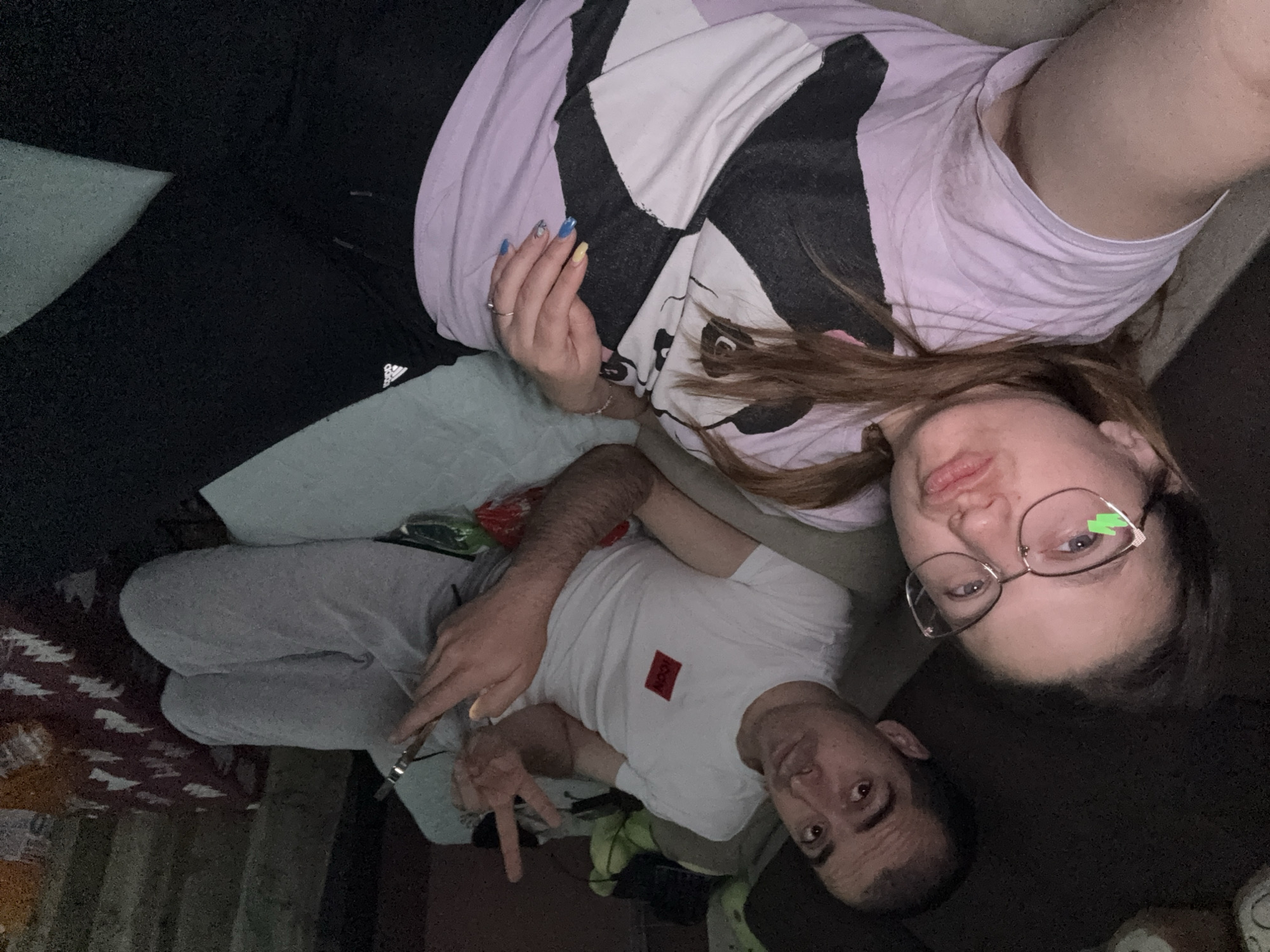 Couple relaxes at home watching TV in Sofia apartment