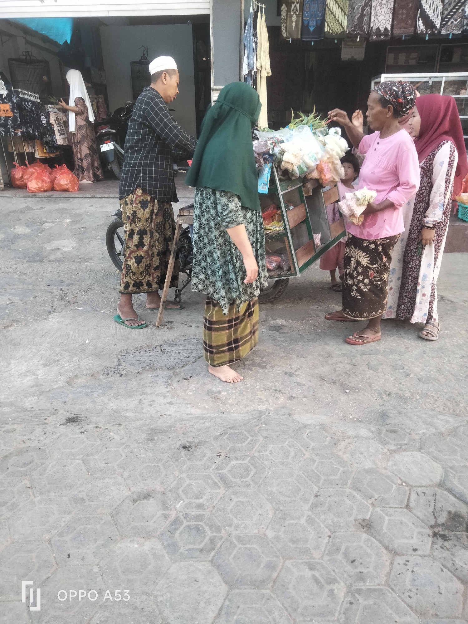Street-side eating and market activity in Badung, Indonesia
