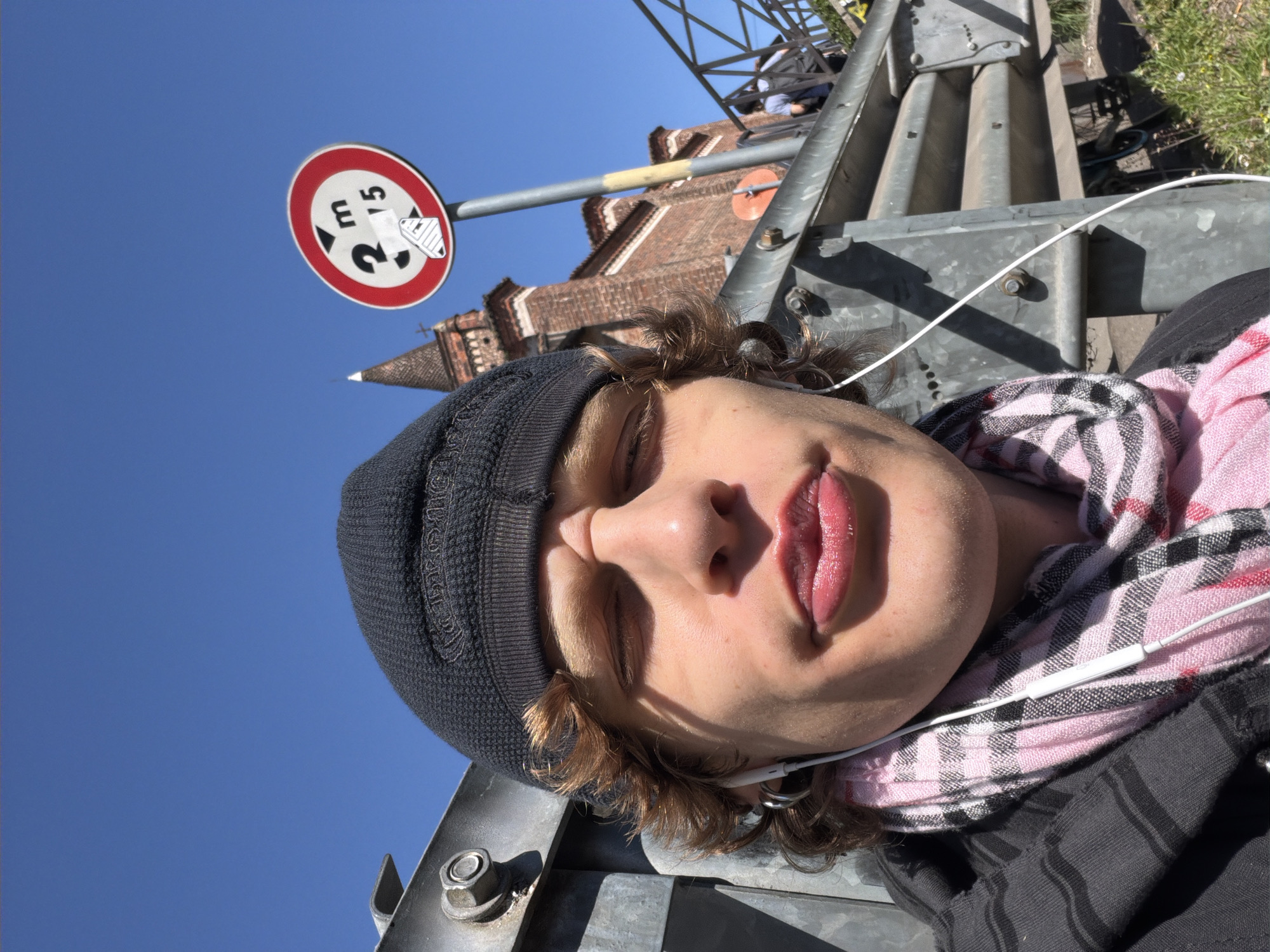 Tourists photograph themselves around Milan's Navigli canal district