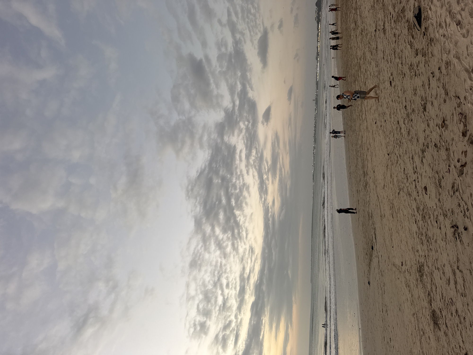 Sunset hour on a Kuta Selatan beach, multiple perspectives