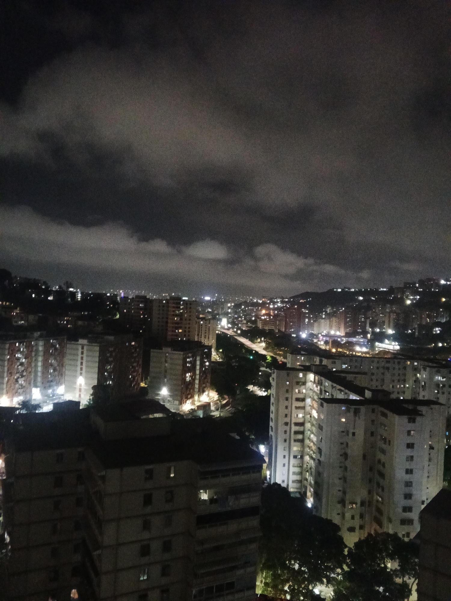 Nighttime Caracas cityscape and domestic moments captured early morning