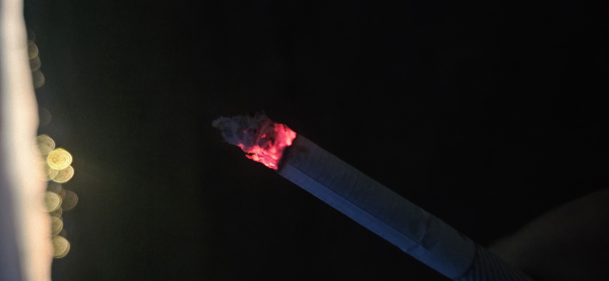 Solitary night vigil captured in Bulgarian mountain pass