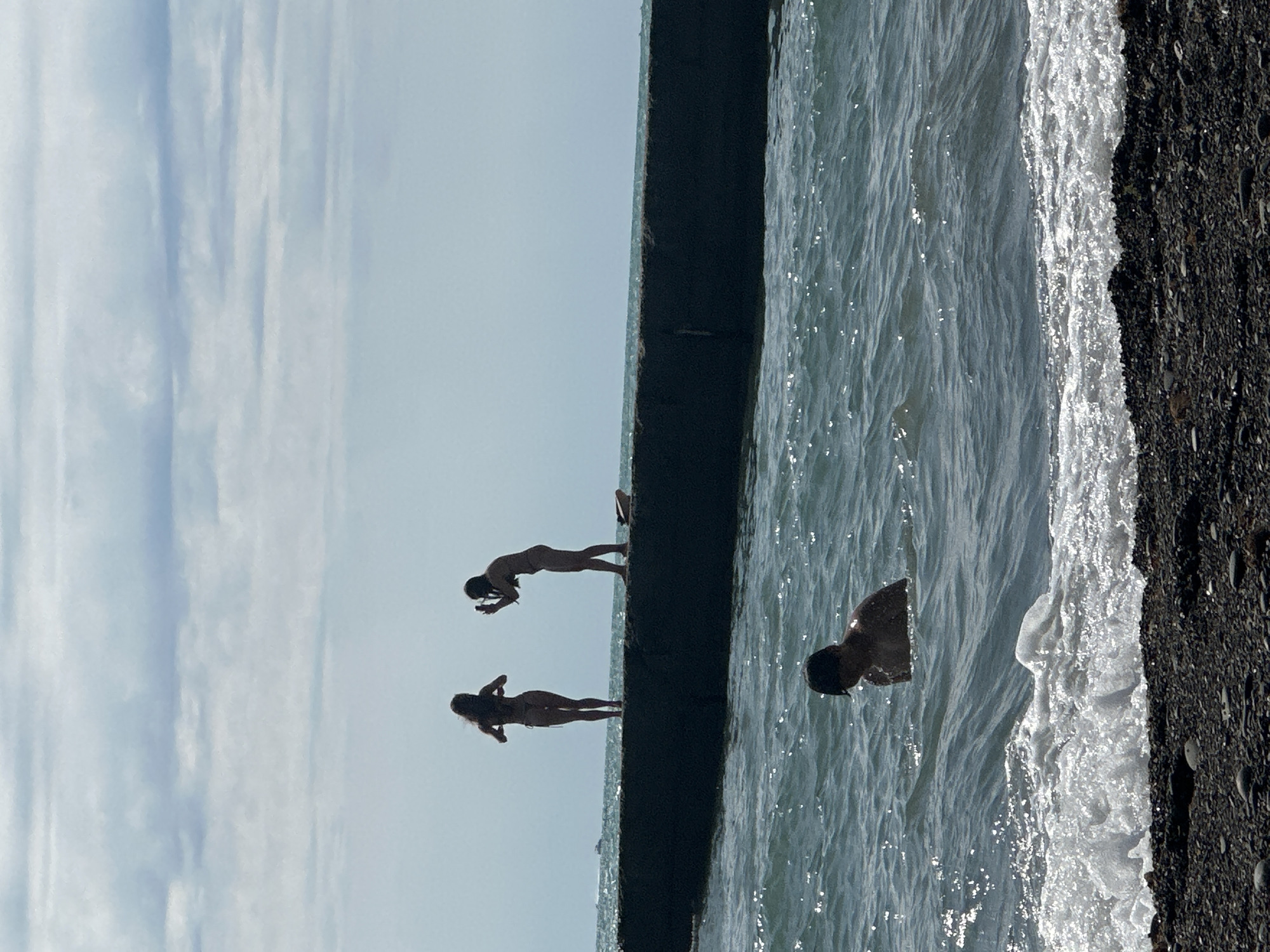Crowded summer day on Sochi's rocky Black Sea beach