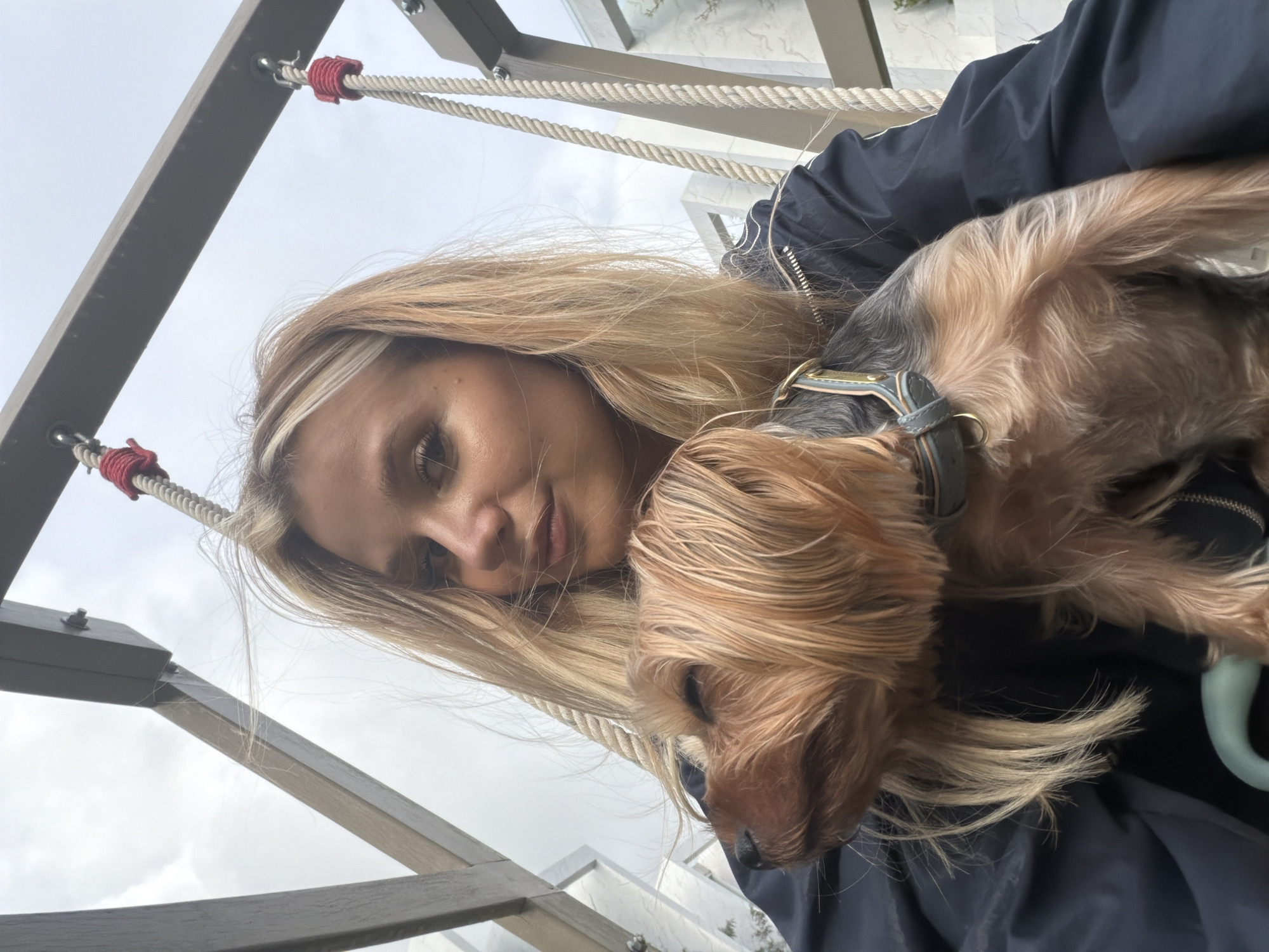 Swing-set selfies with a Yorkshire Terrier in Thep Krasatti
