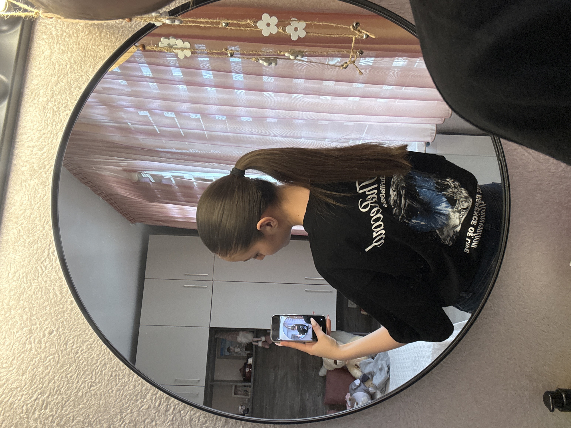 Woman takes mirror selfie in Bulgarian village
